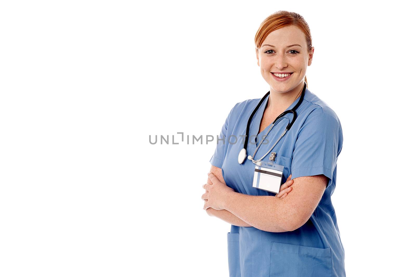 Confident female nurse with welcoming smile