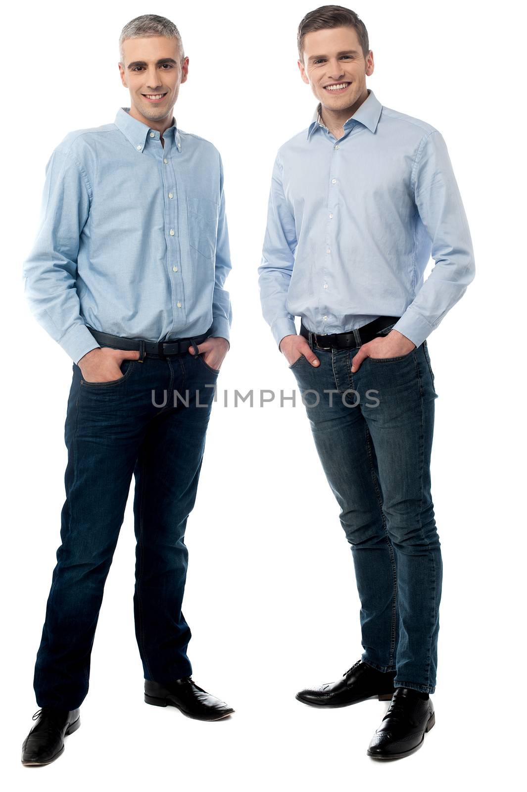 Full length of casual young men posing in style