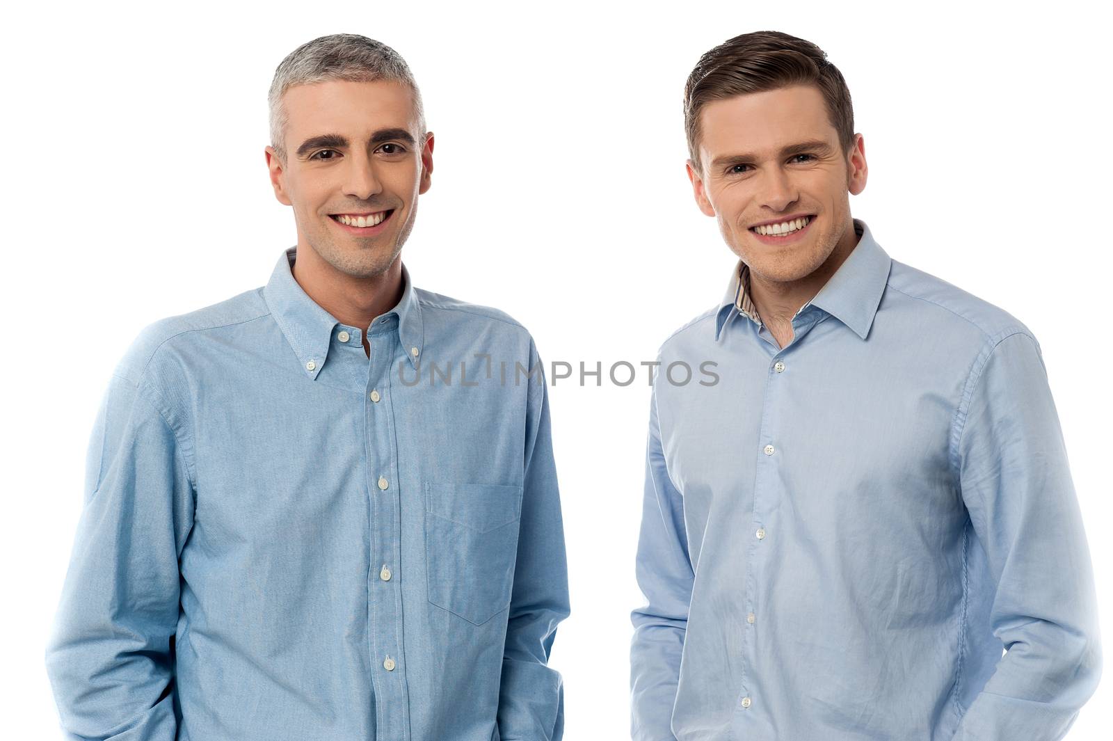 Happy casual men posing by stockyimages