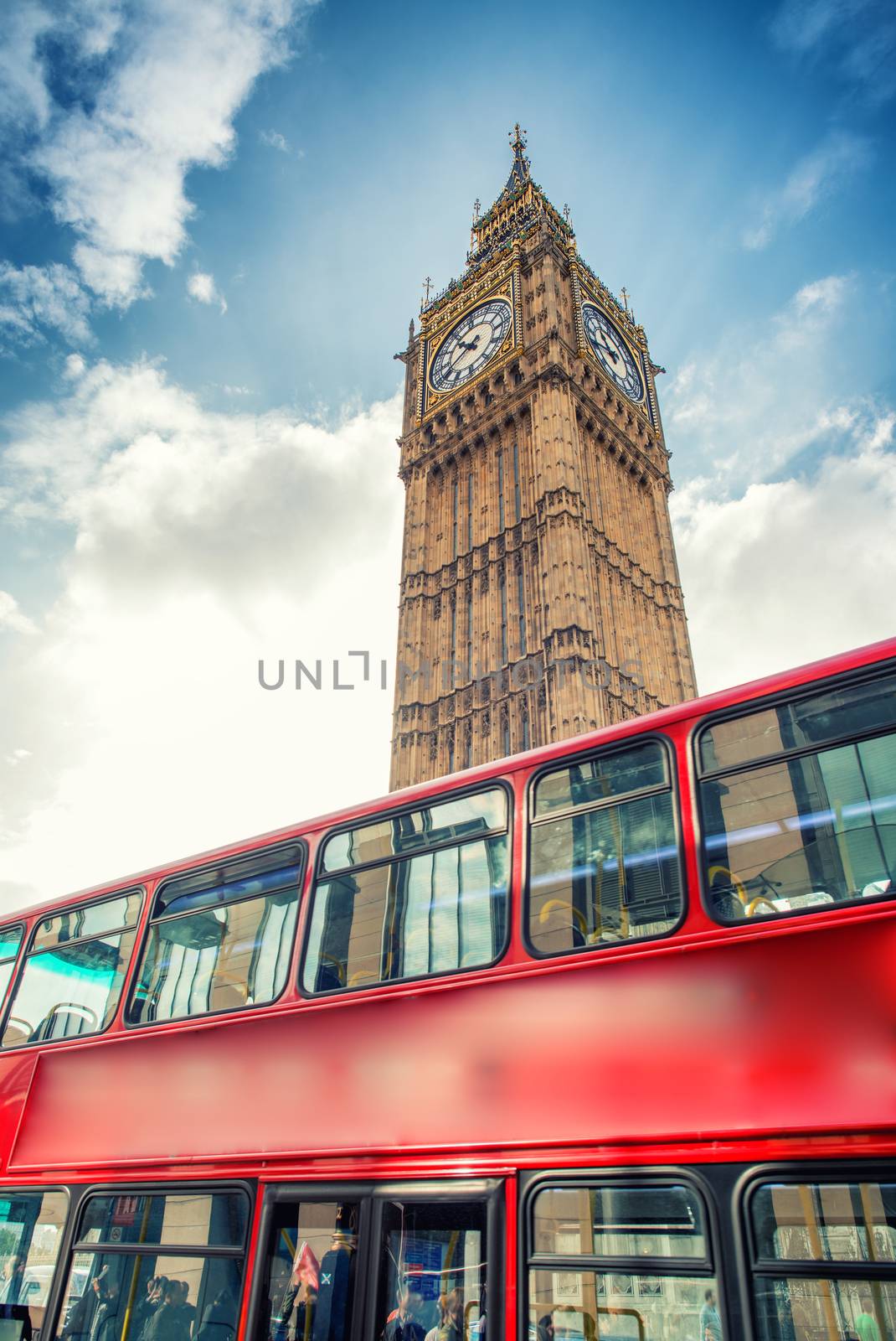 Red Double Decker Bus under Big Ben. London travel concept by jovannig