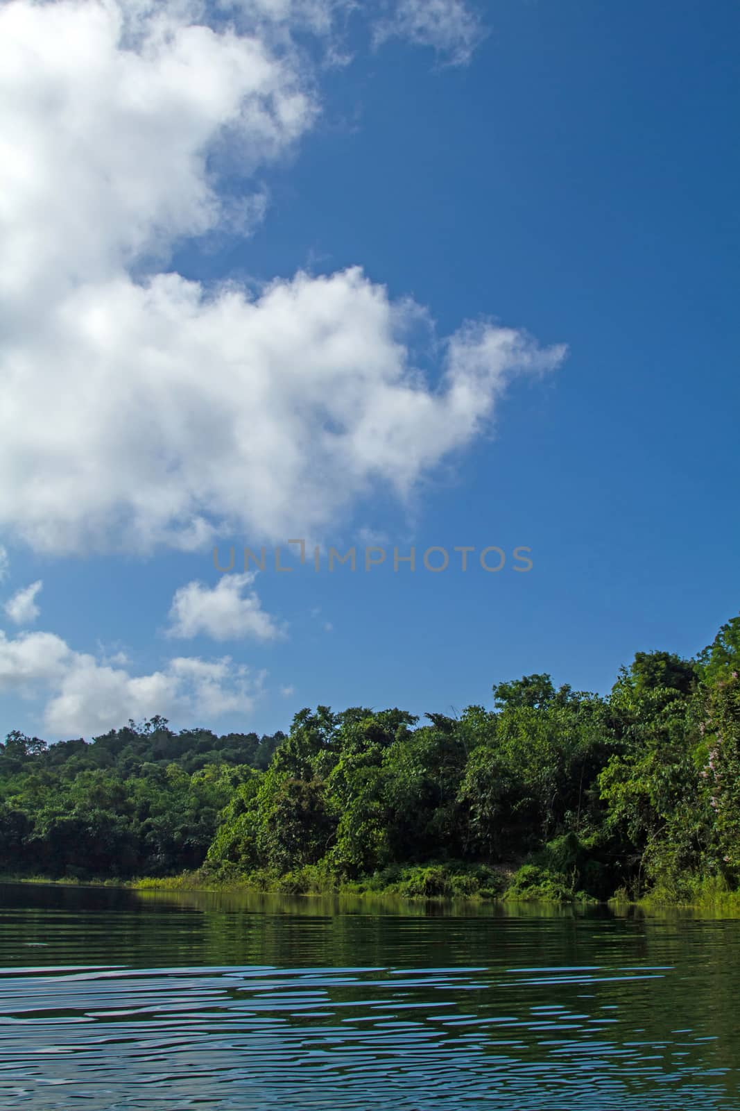 Lake mountain with clouds and blue sky