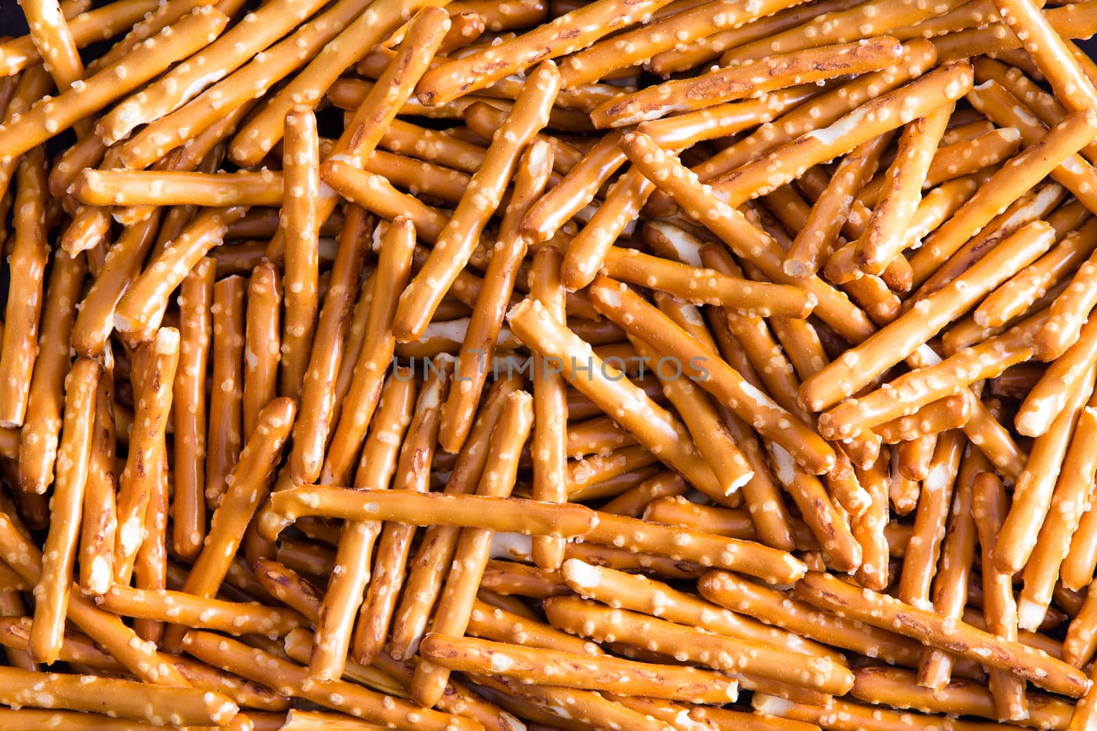 Close up Plenty Salted Baked Pretzel Sticks Wallpaper Backgrounds, Captured in High Angle View.