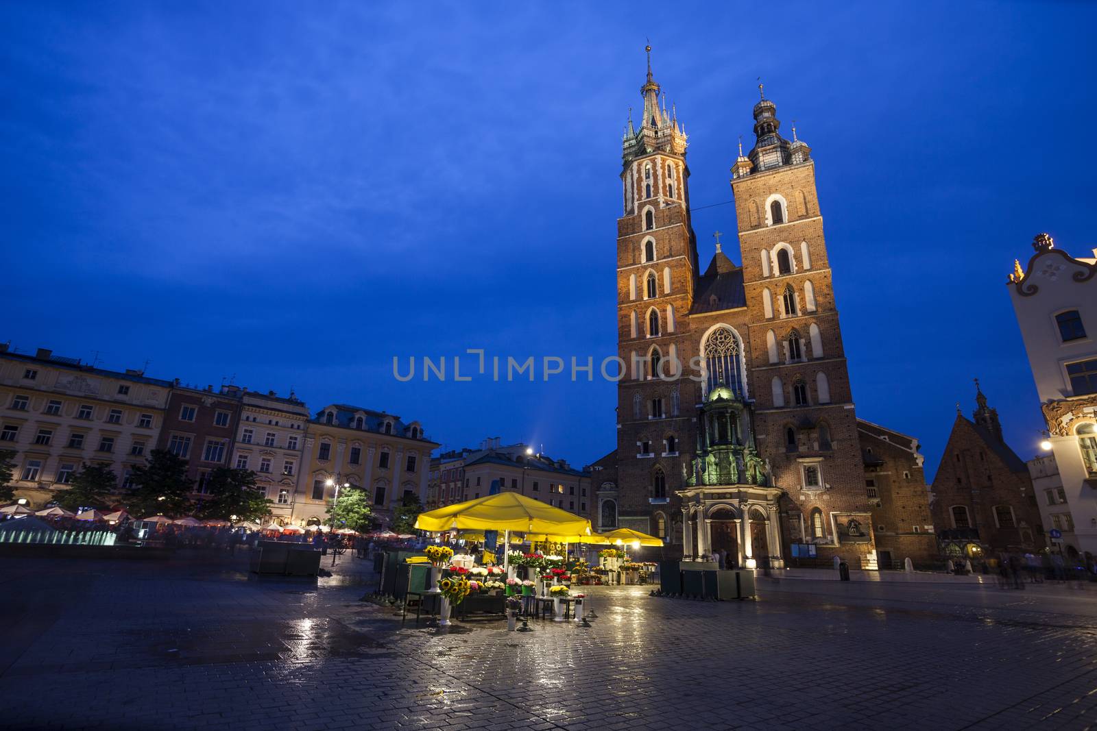 Church of St. Mary in Krakow Main Market Square during Twilight time