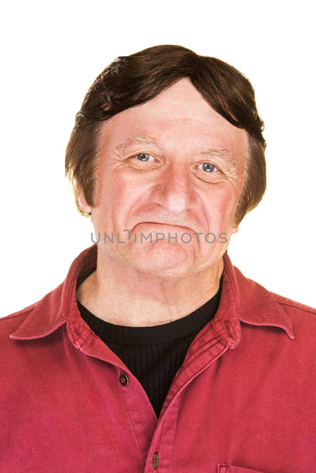 Single easygoing man with friendly expression over white