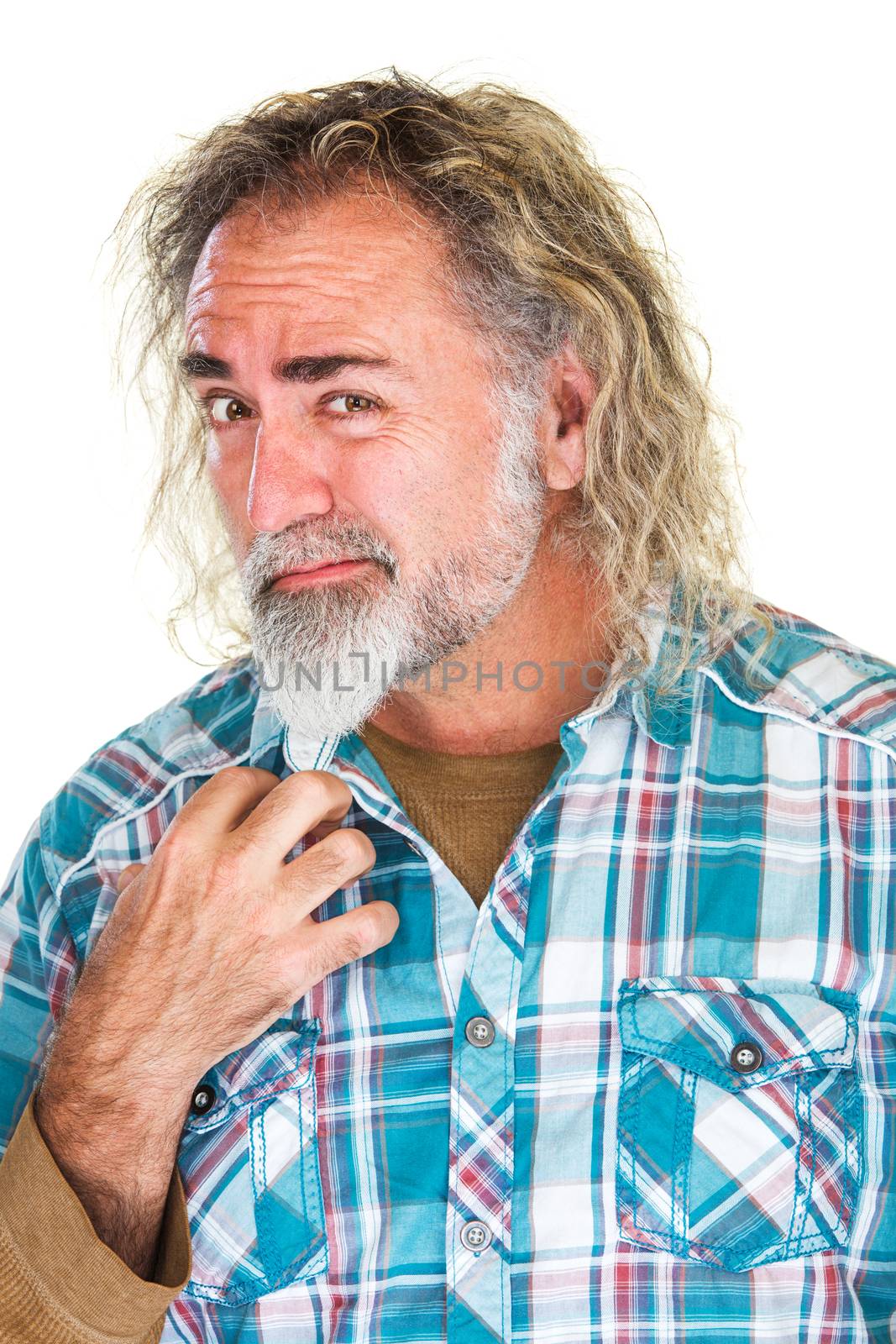 Bearded mature man with confused expression over white