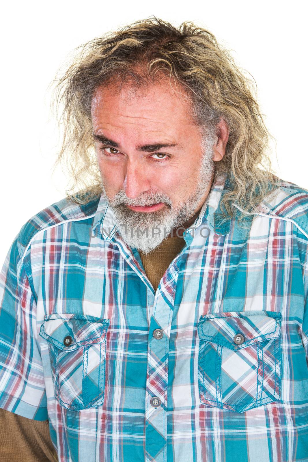 Disappointed Caucasian bearded man in flannel shirt