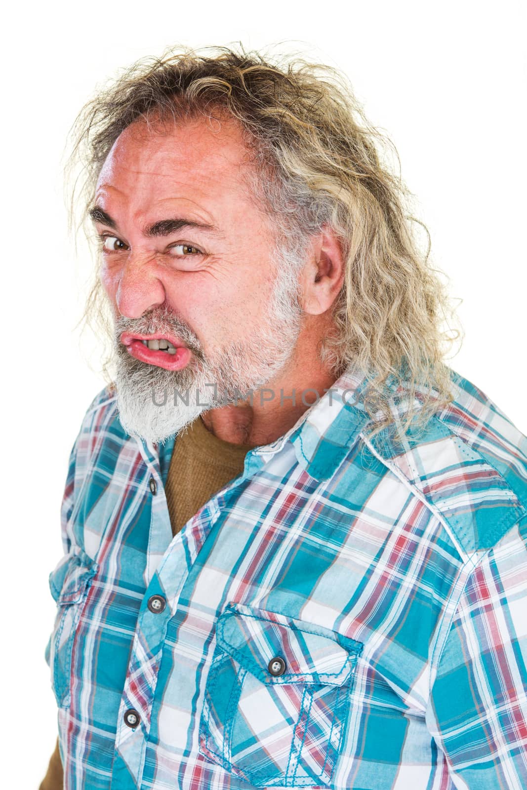 Mad man with beard and curling lip over white