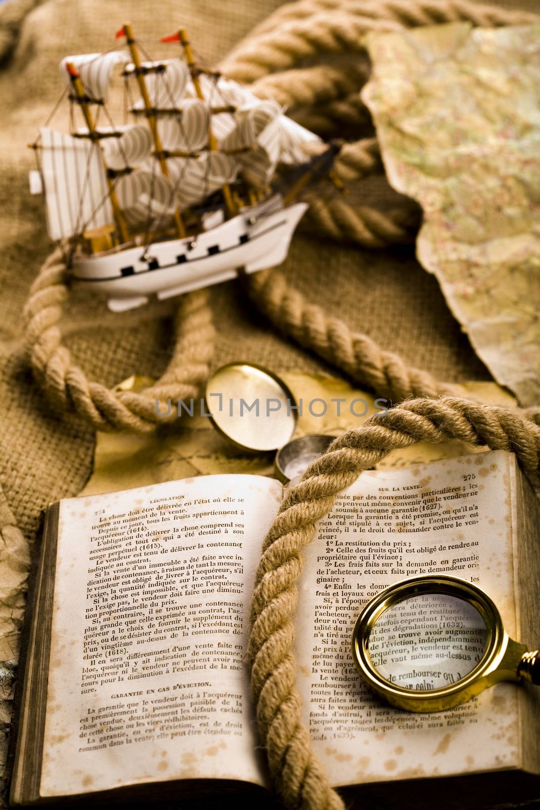 Magnifying glass, Compass and globe, ambient light travel theme by JanPietruszka