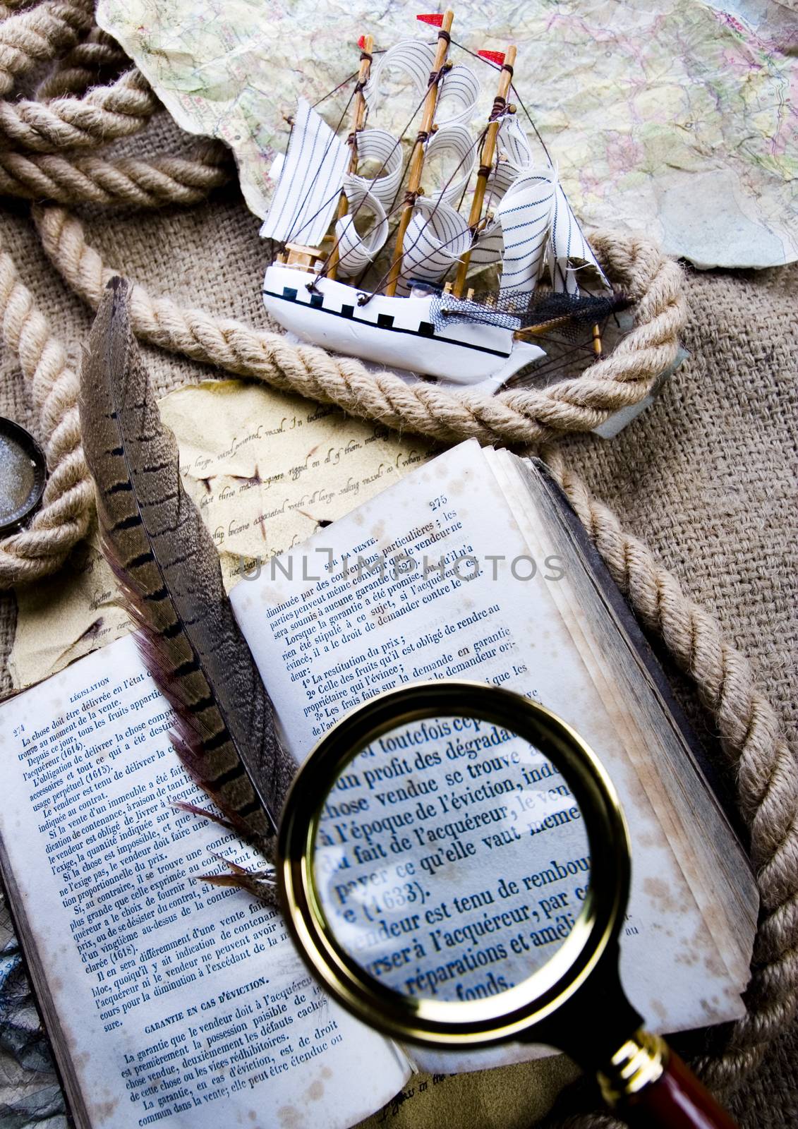 Magnifying glass, Compass and globe, ambient light travel theme by JanPietruszka