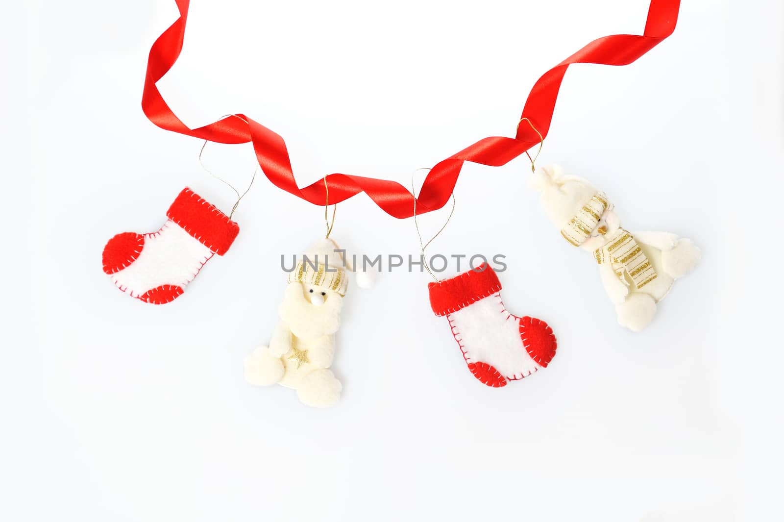Christmas garland ornament background of boots and a snowman and Santa Claus