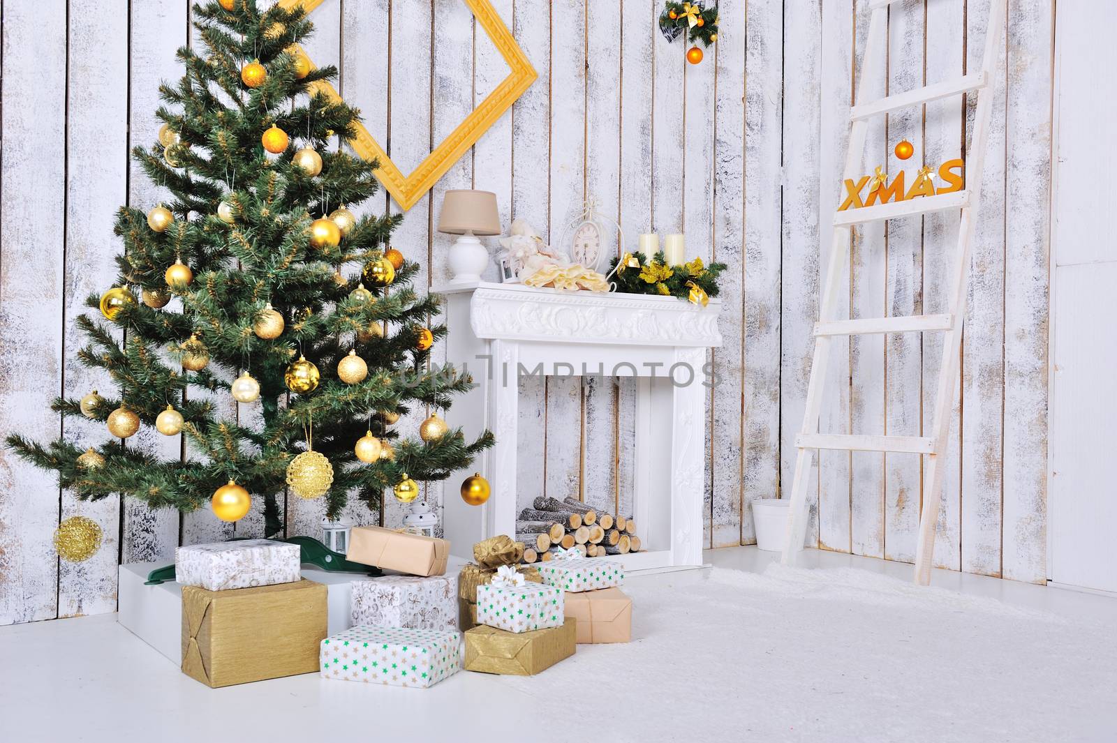 Christmas interior in white and gold color with Christmas tree and gifts