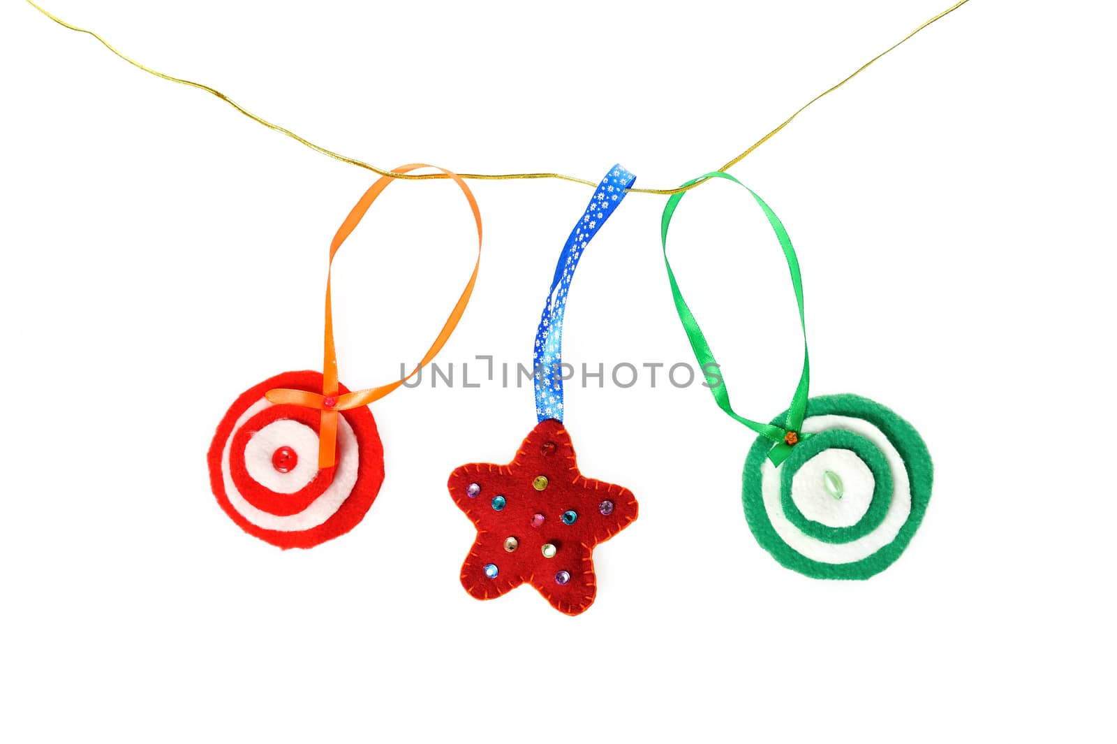 Garland of Christmas handmade toys. Handmade Christmas decorations made. of felt hanging on a rope