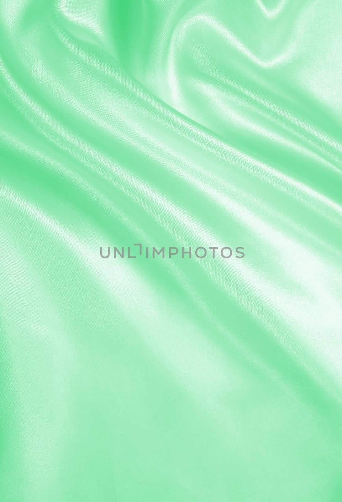 Smooth elegant green silk or satin can use as background 