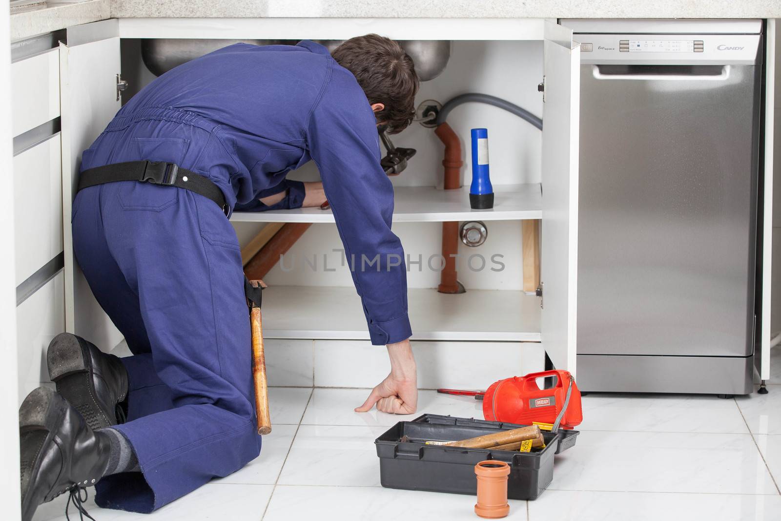 Plumber repairing the skin