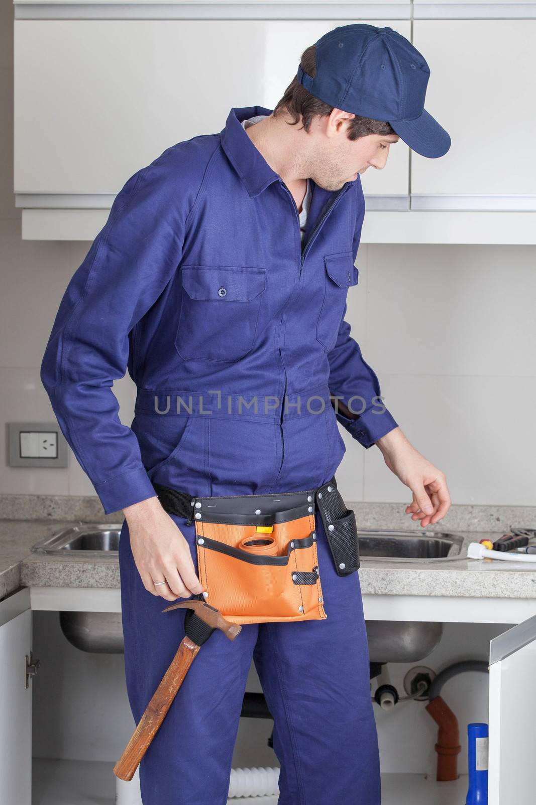 The plumber in the kitchen