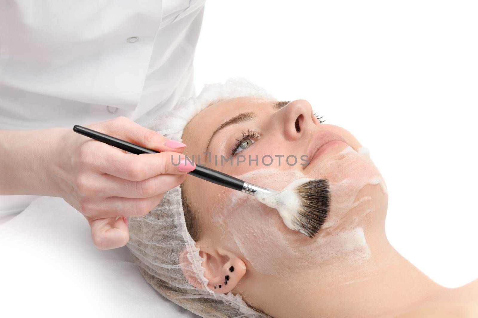 beauty salon, facial mask applying using brush