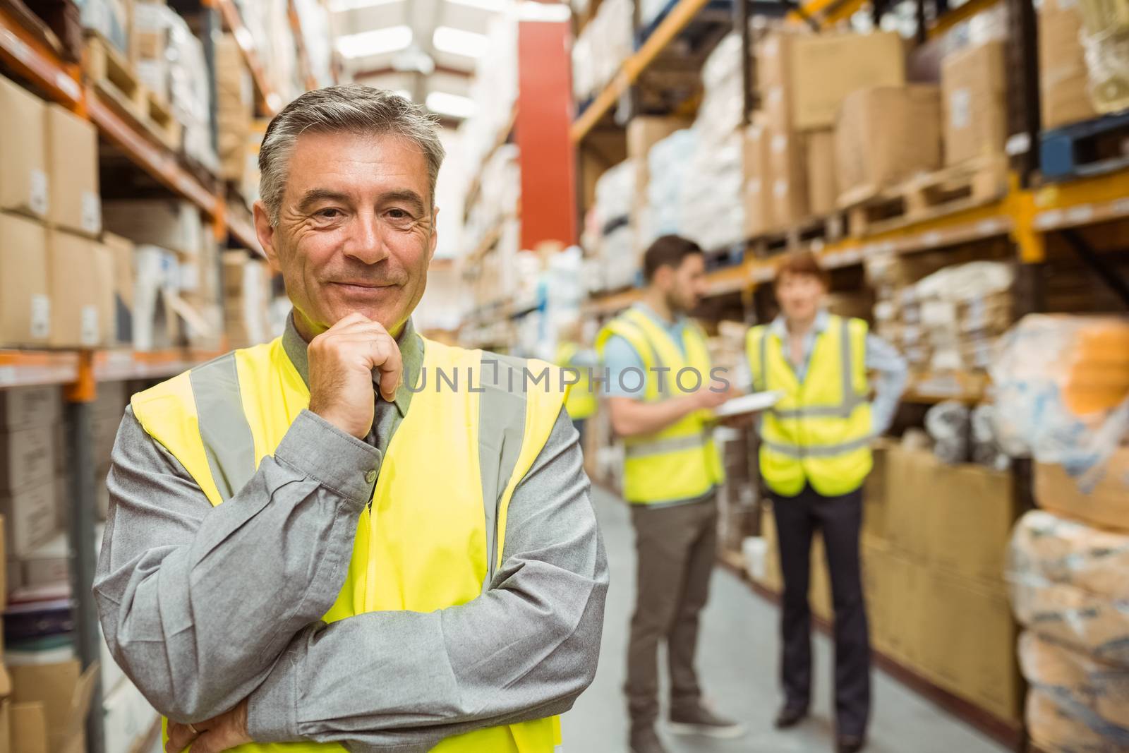 Portrait of smiling warehouse manager by Wavebreakmedia