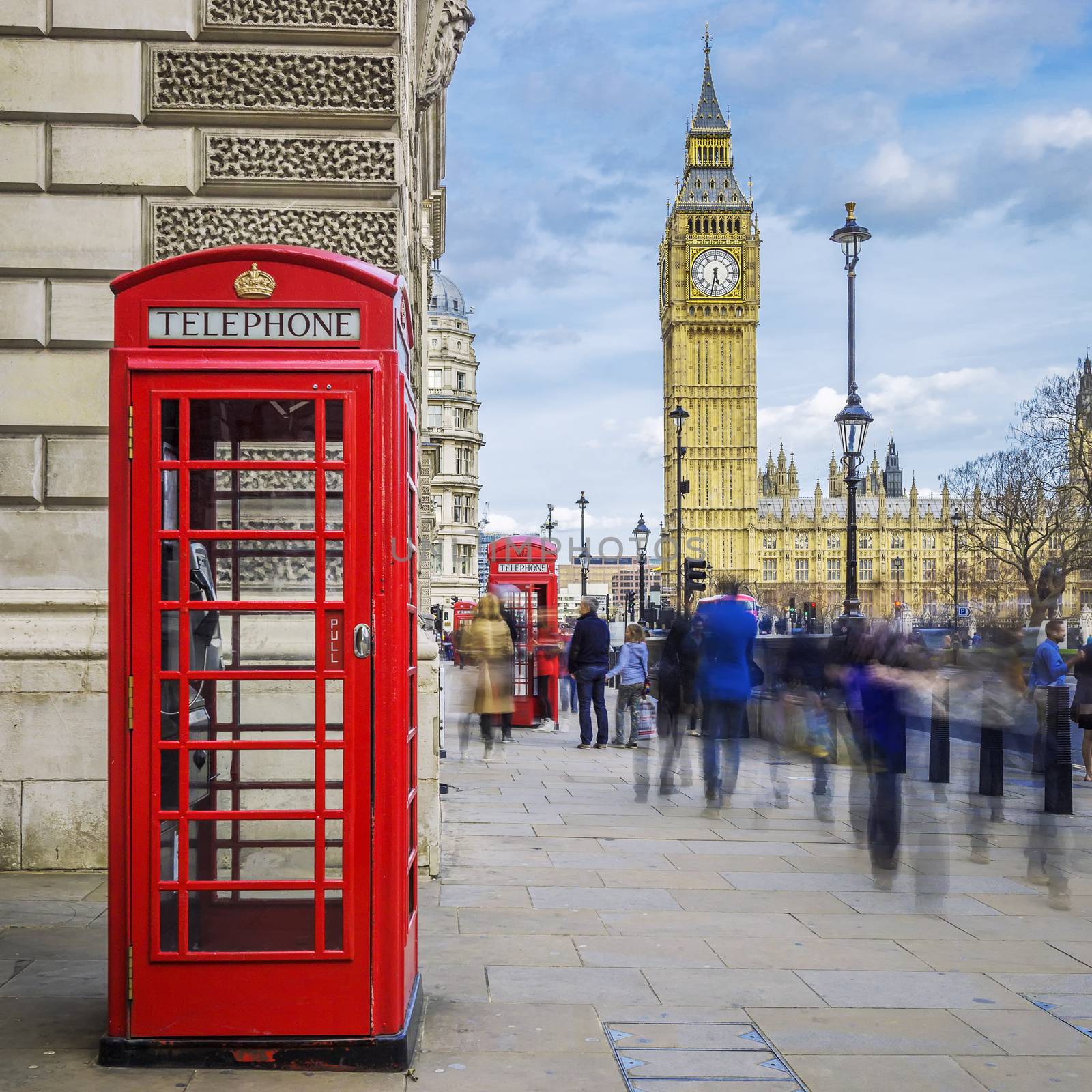 Red phone box with Big Ben on background, London.