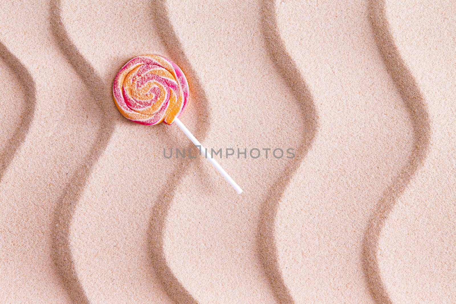 Nothing tastes crunchier than a sandy lollipop at the beach by coskun