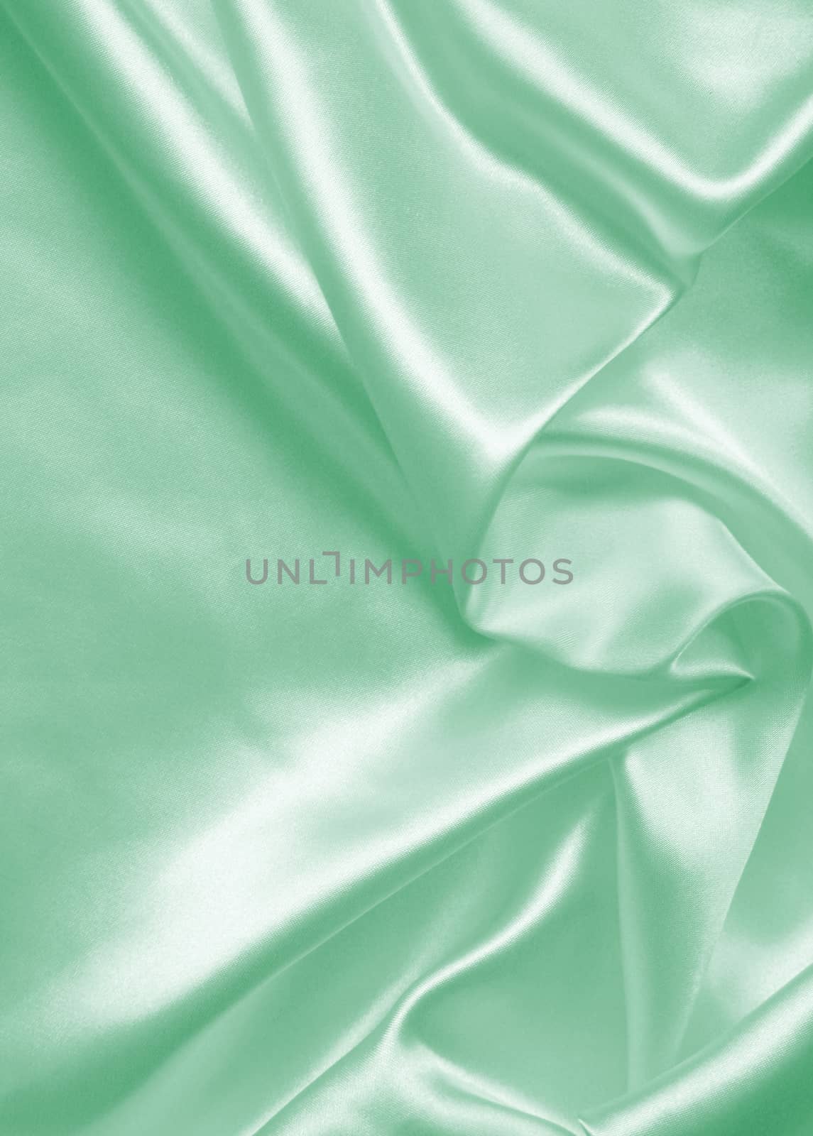 Smooth elegant green silk or satin can use as background 