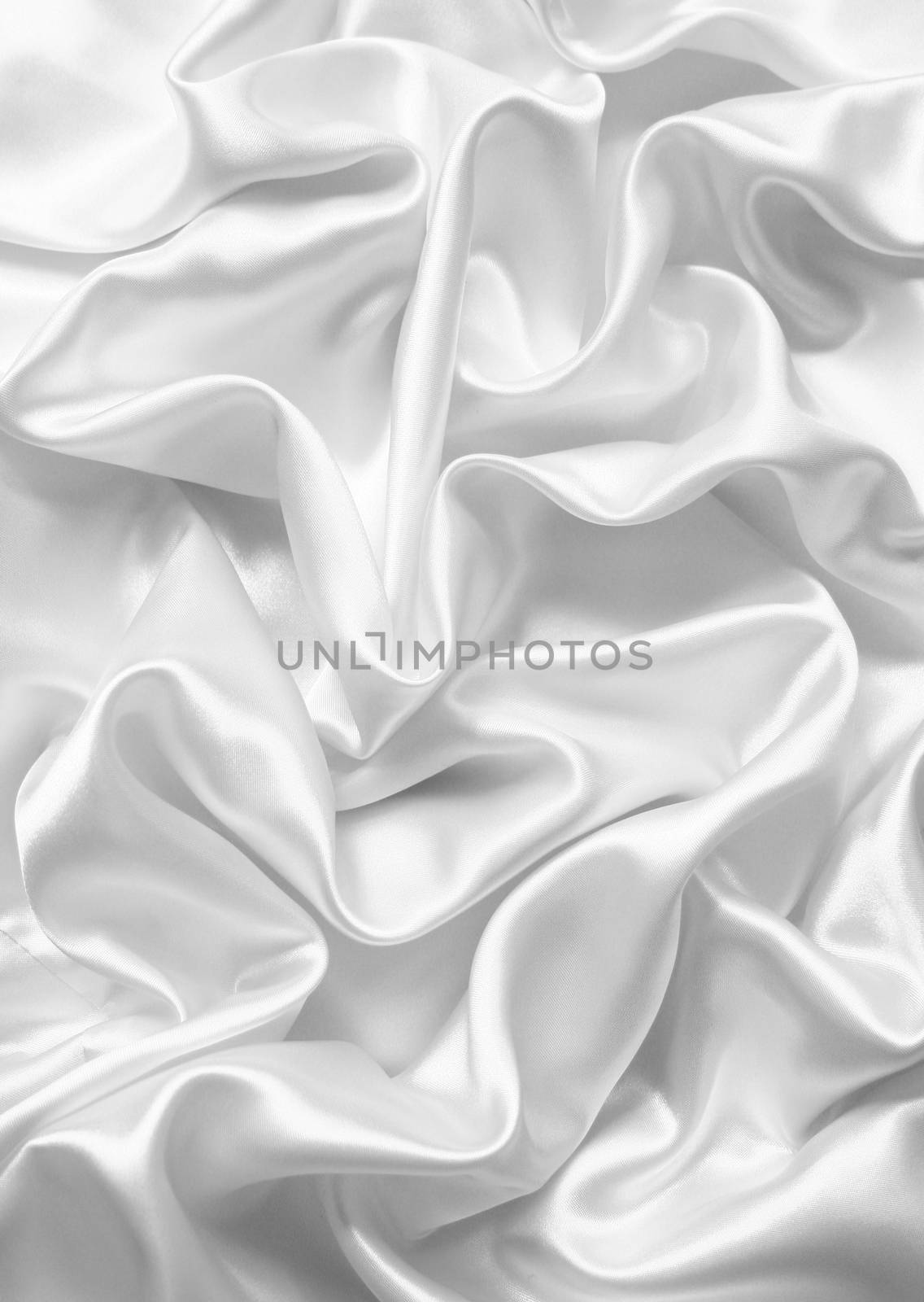 Smooth elegant white silk or satin as wedding background by oxanatravel