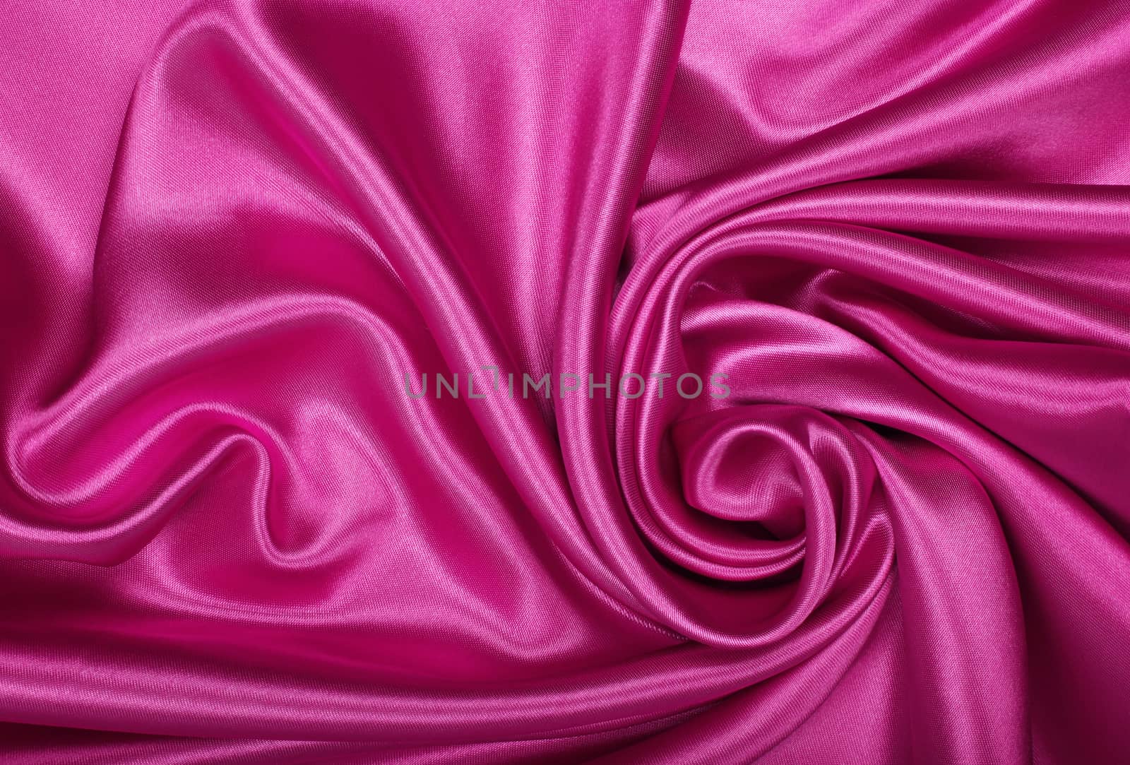Smooth elegant pink silk or satin as background by oxanatravel