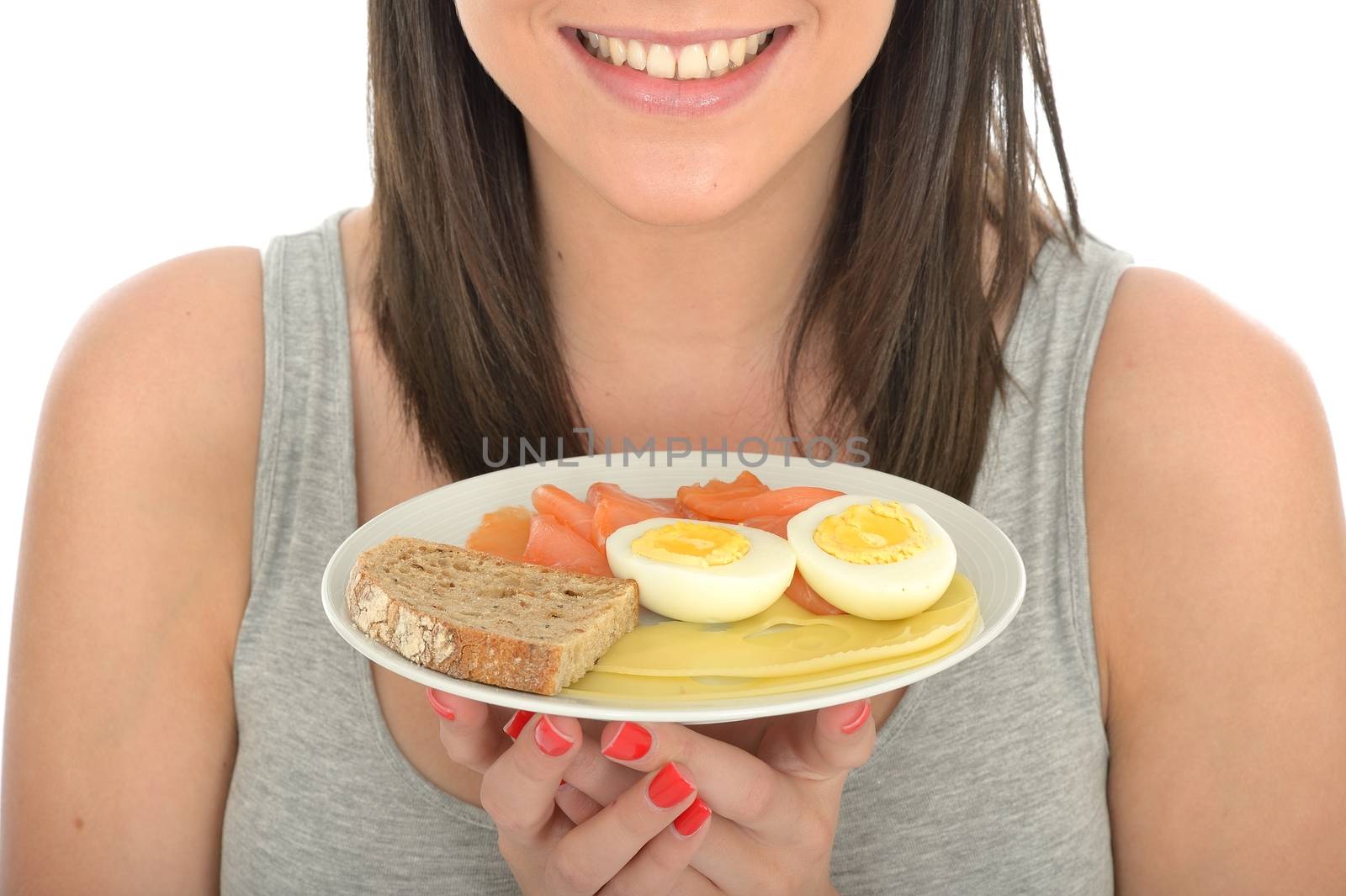 Attractive Young Woman Holding a Typical Healthy Norwegian Breakfast of Eggs Cheese and Smoked Salmon