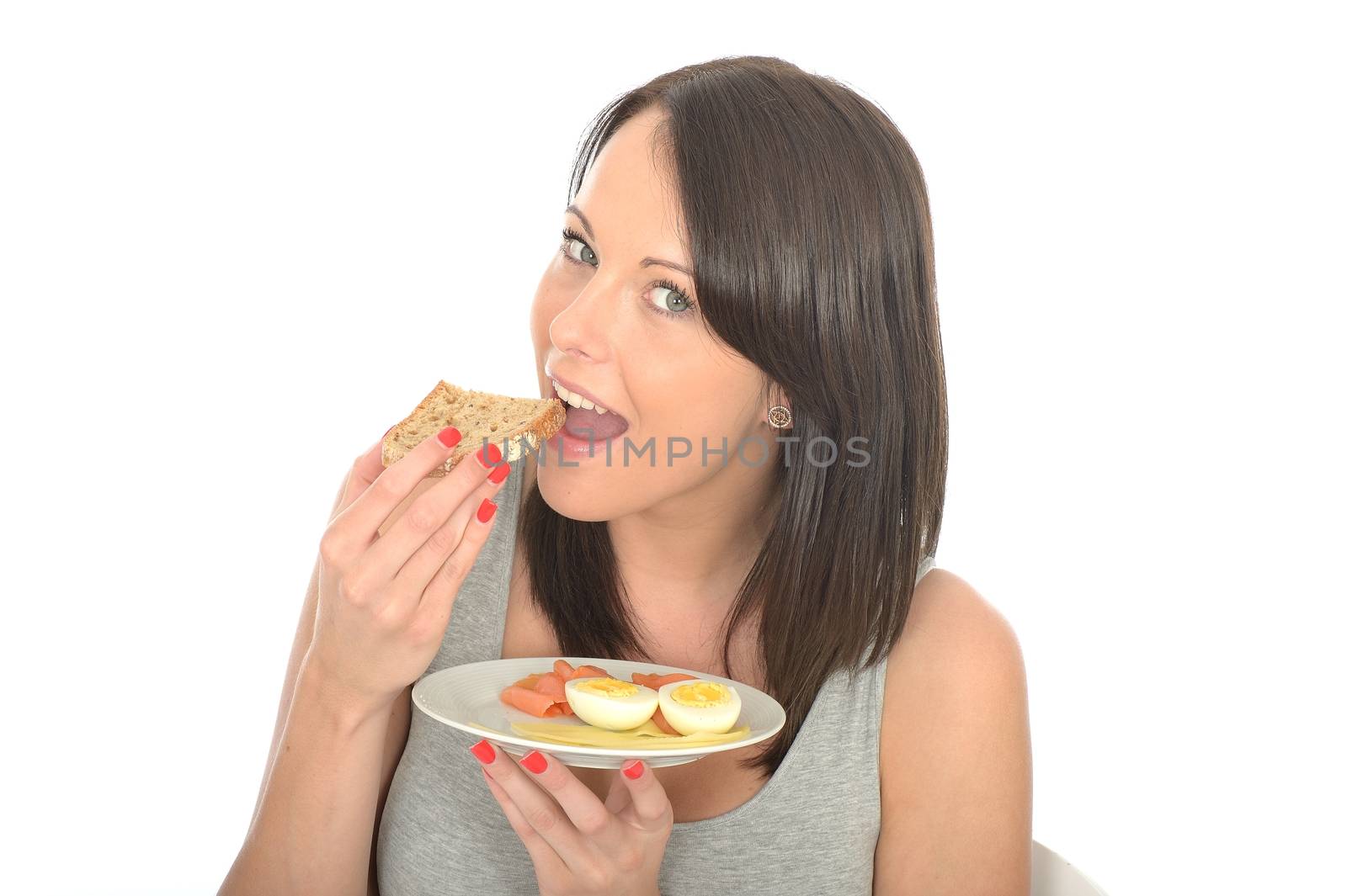 Attractive Young Woman Holding a Typical Healthy Norwegian Break by Whiteboxmedia