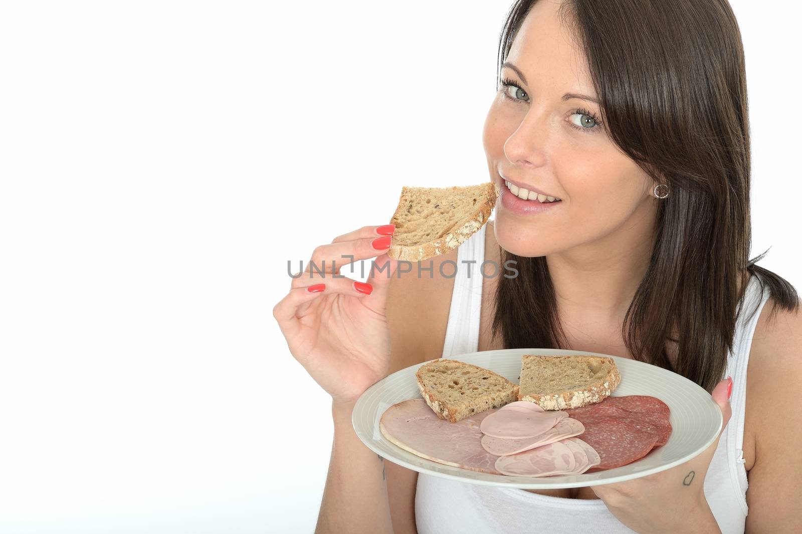 Healthy Attractive Young Woman Holding a Typical Norwegian Style Cold Buffet Breakfast of Meats and Bread