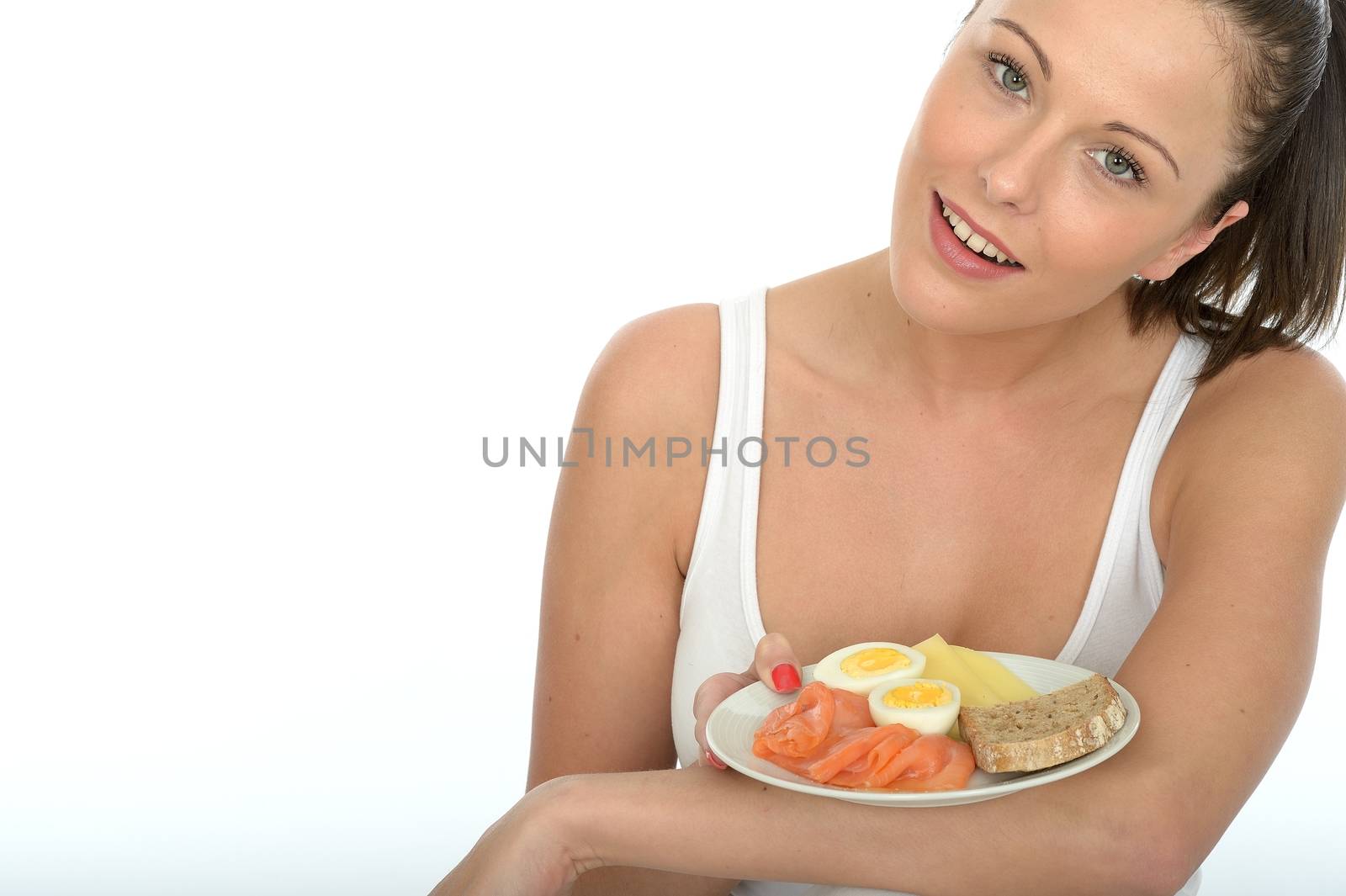 Healthy Young Woman Holding a Typical Norwegian or Scandinavian  by Whiteboxmedia