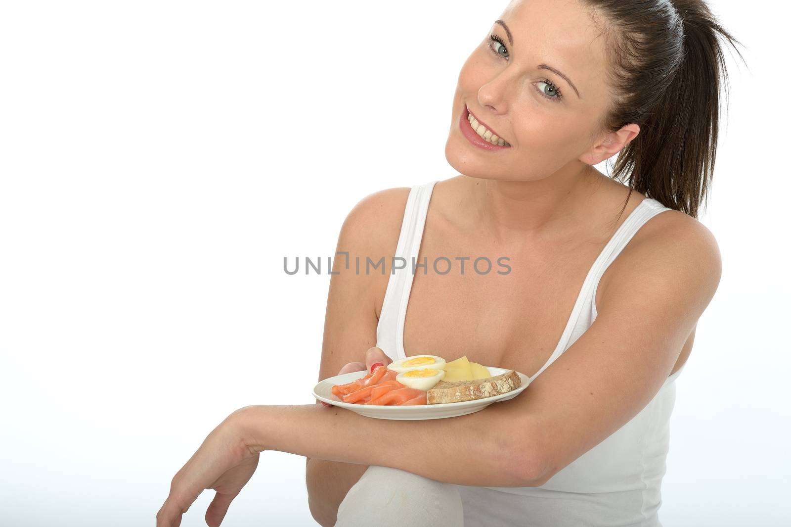 Healthy Young Woman Holding a Typical Norwegian or Scandinavian  by Whiteboxmedia