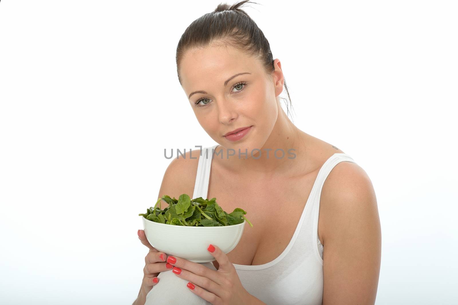 Healthy Happy Attractive Young Woman Holding a Bowl of Spinach