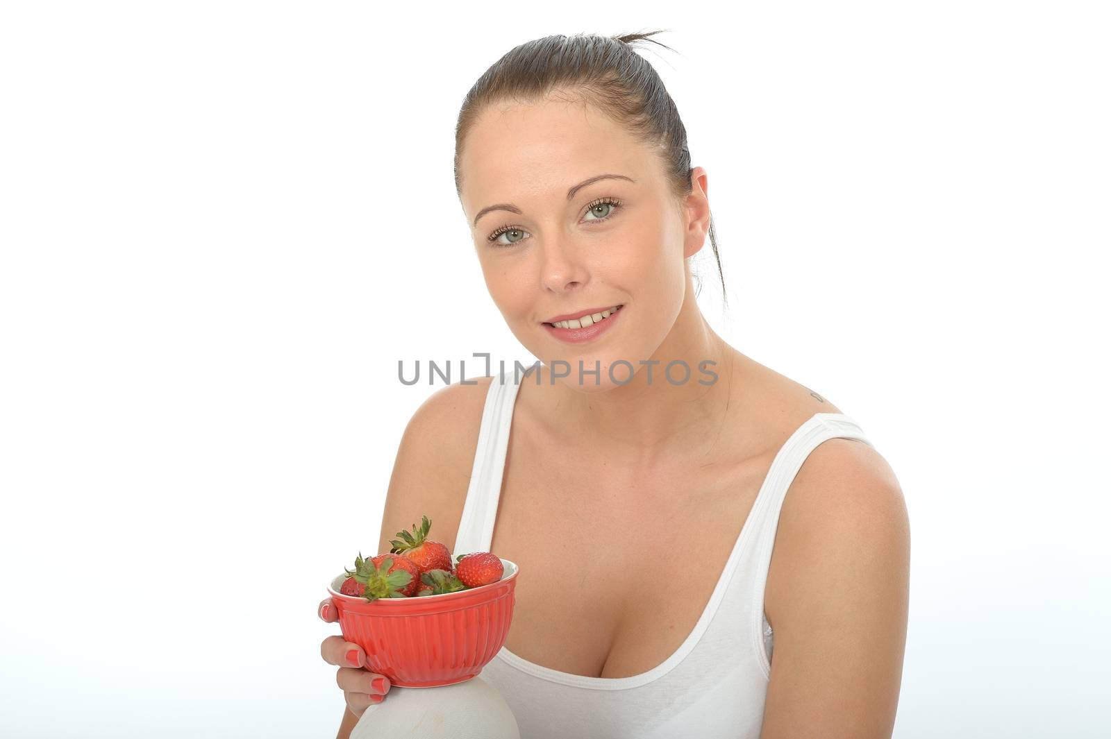 Healthy Fit Young Woman Holding a Bowl of Fresh Ripe Juicy Straw by Whiteboxmedia