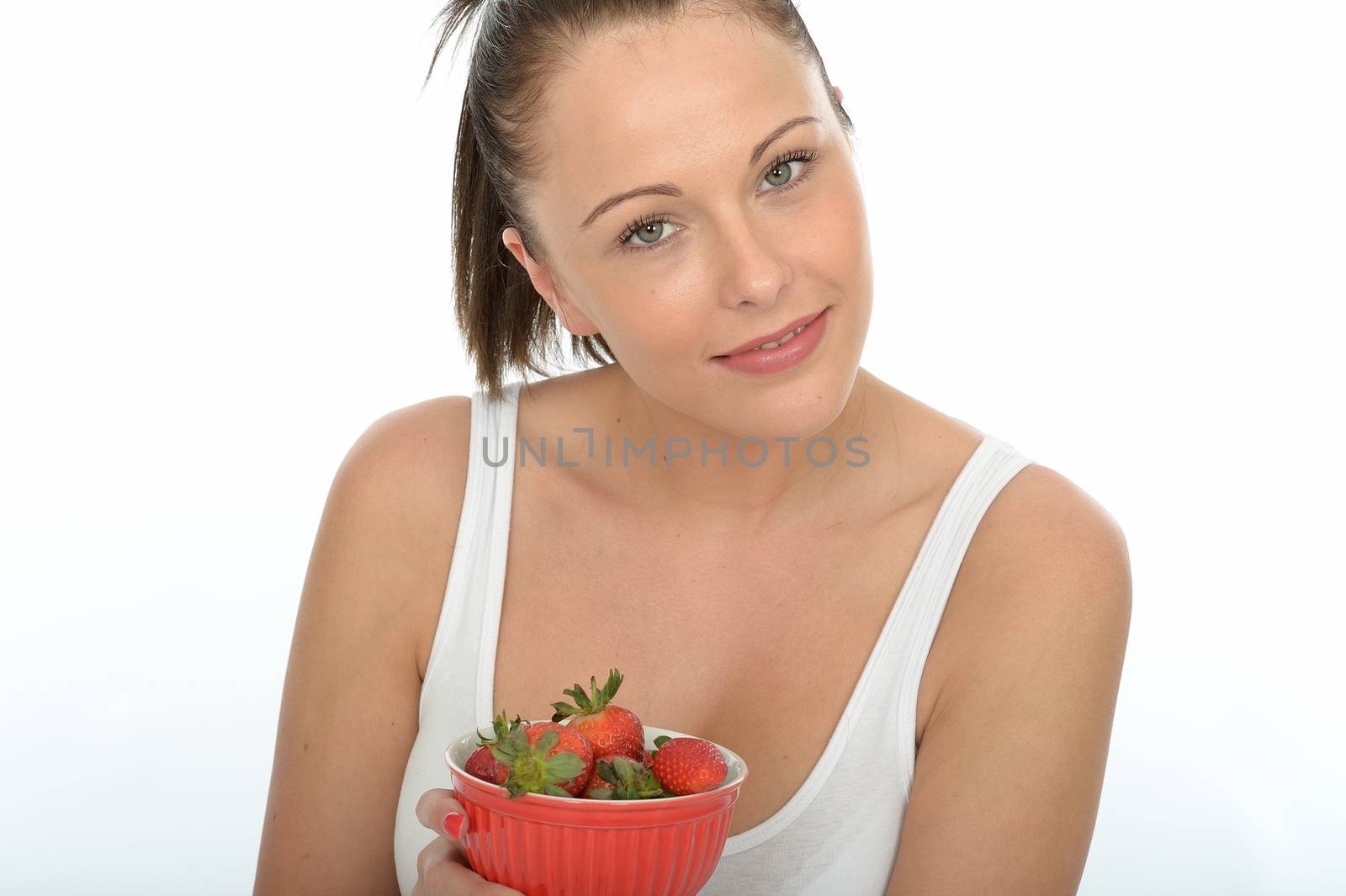 Healthy Fit Young Woman Holding a Bowl of Fresh Ripe Juicy Straw by Whiteboxmedia