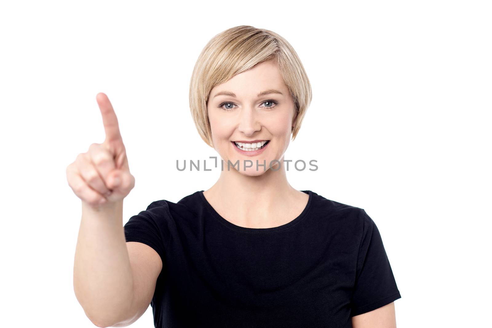 Woman showing her finger to copy space