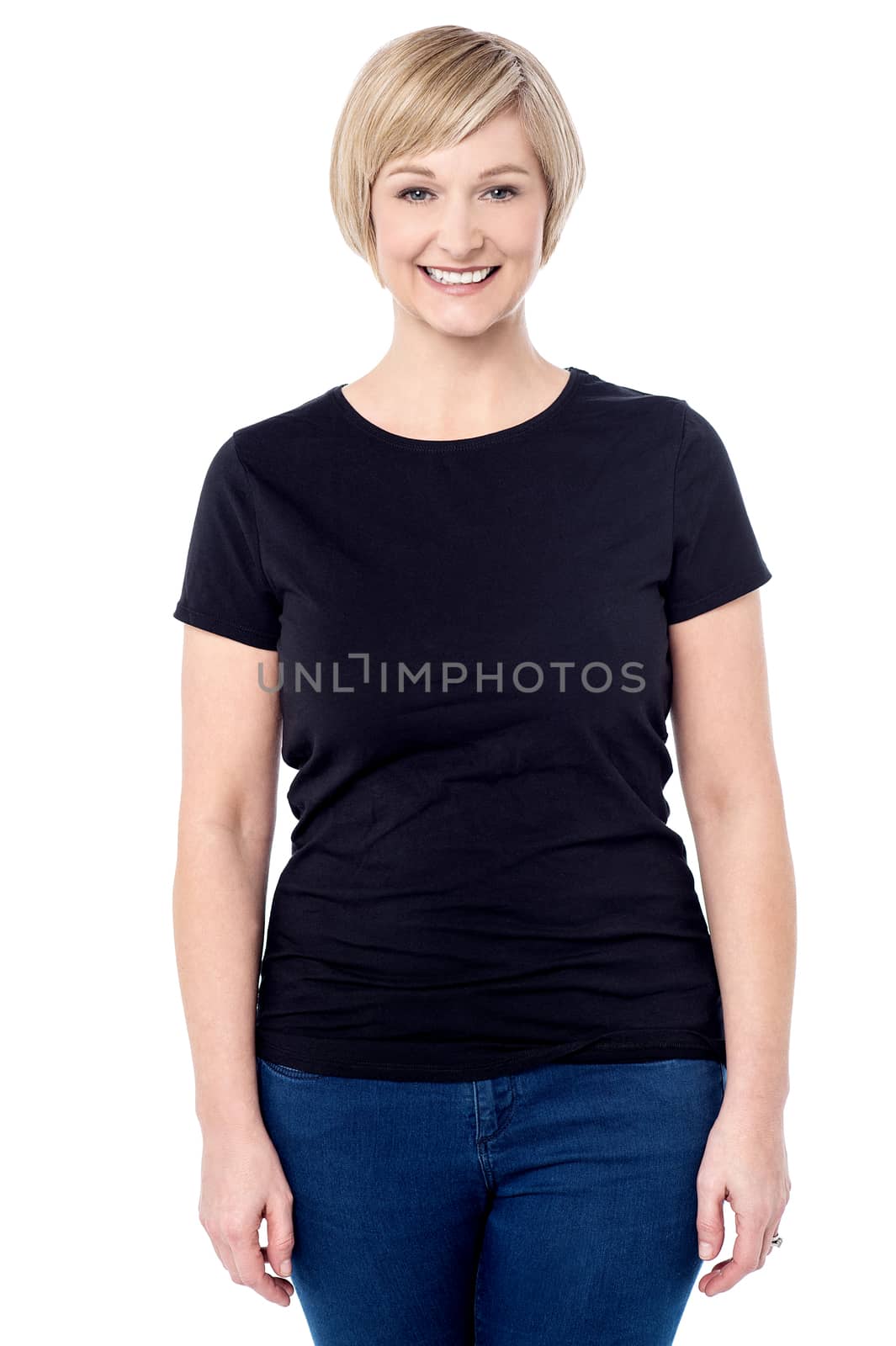Smiling middle aged woman posing casually