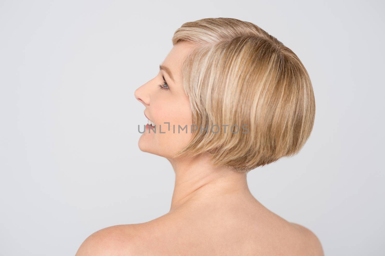 Bare shoulder woman looking at copy space