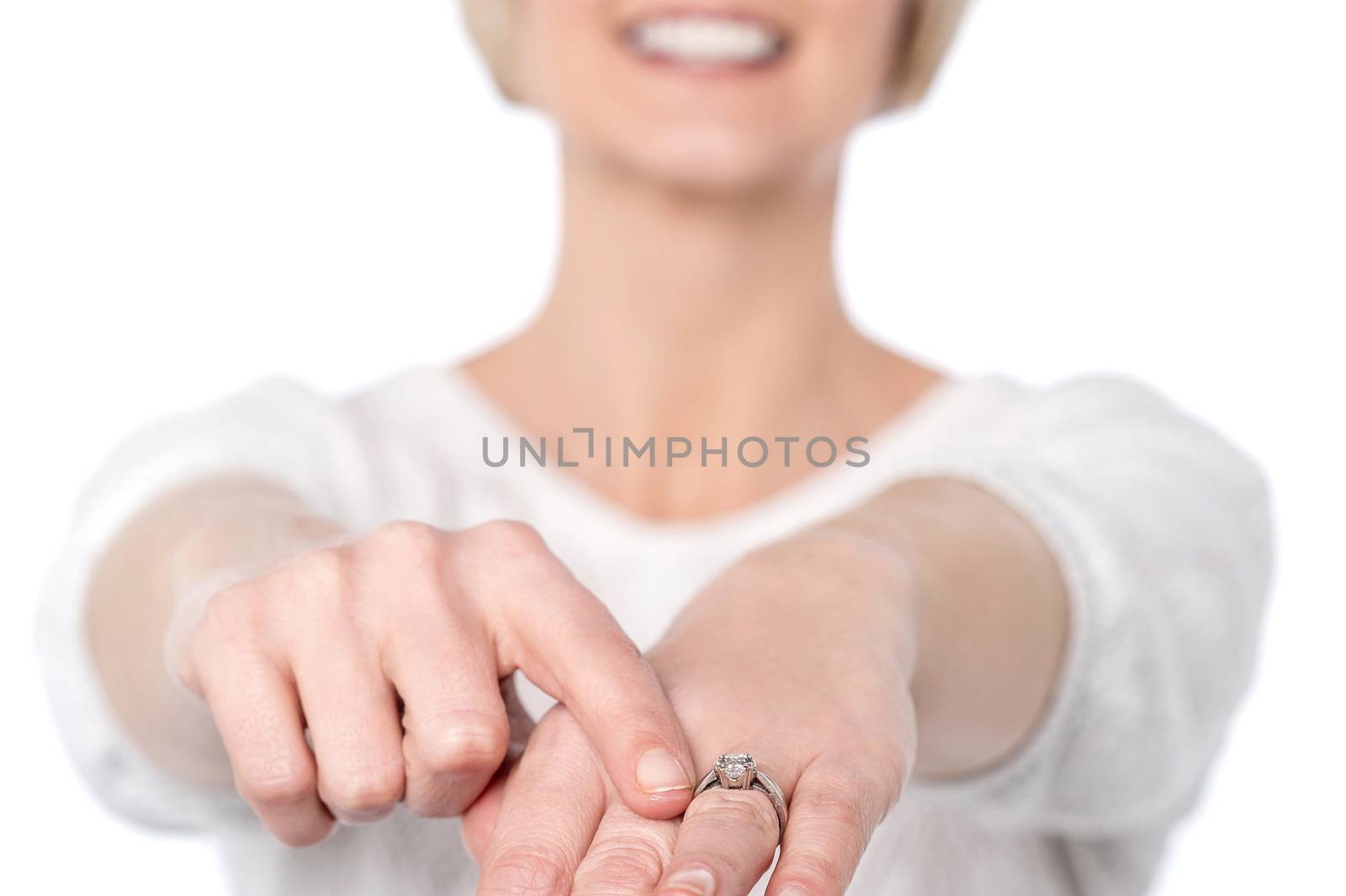 Woman showing her new diamond ring