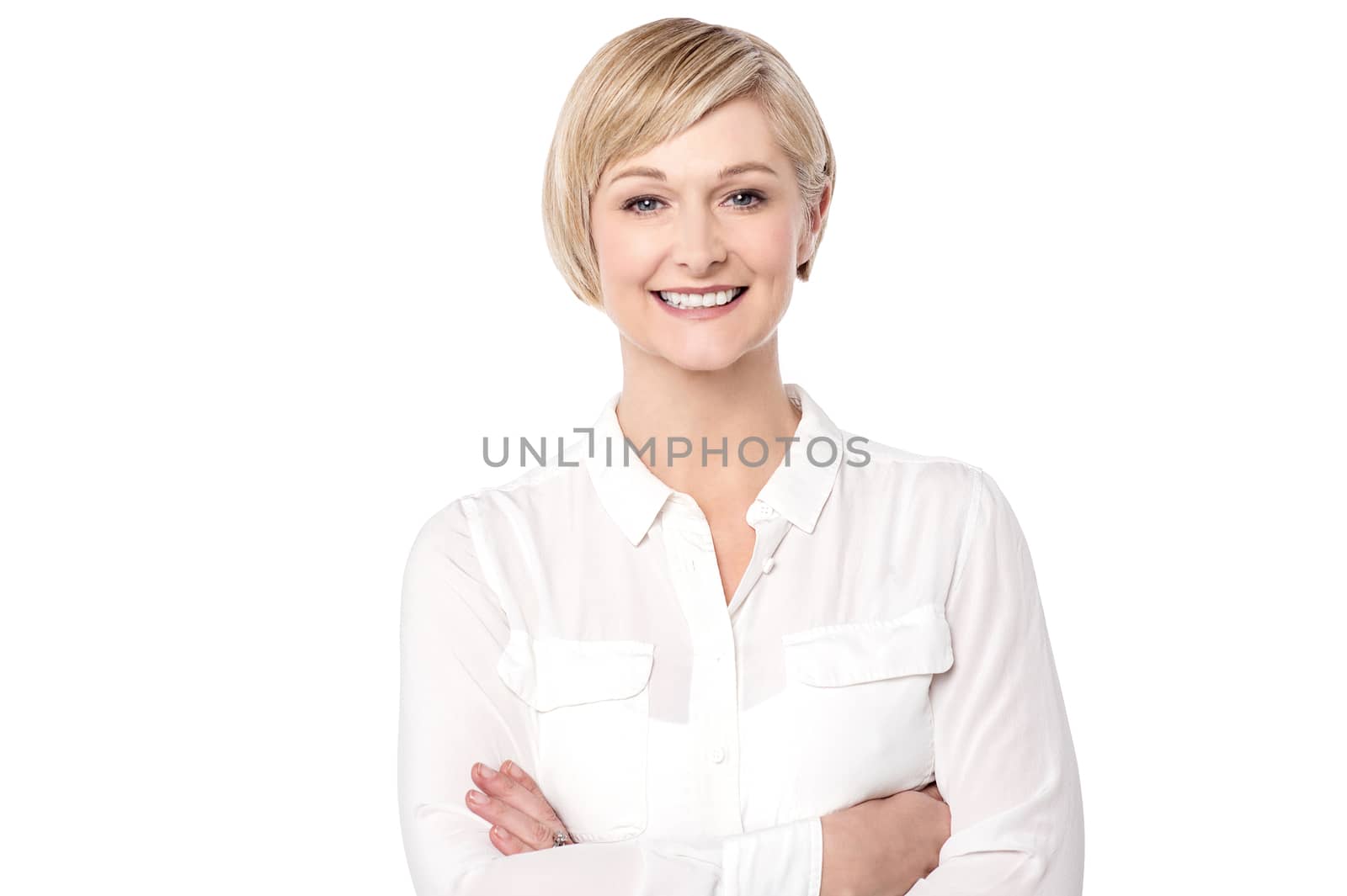 Smiling middle aged woman with folded arms