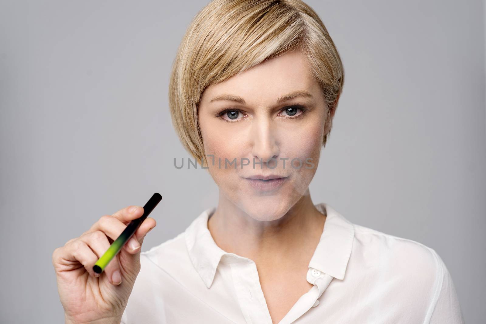 Mid woman smoking modern e-cigarette
