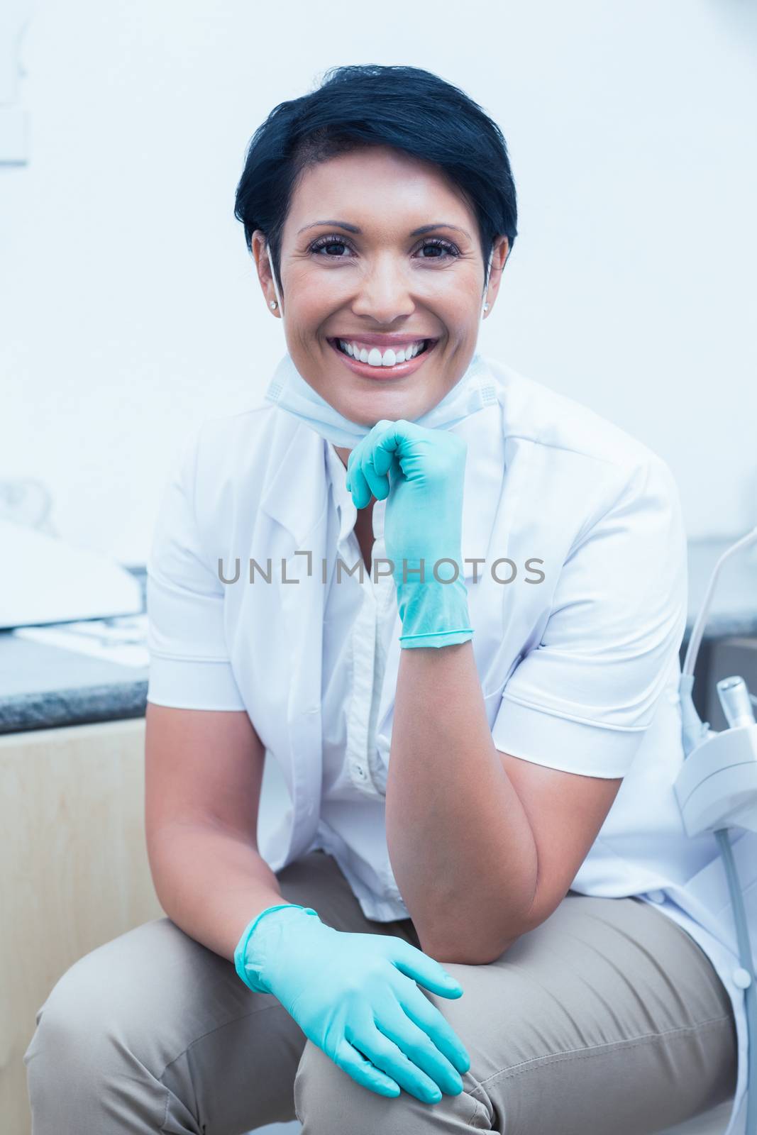 Portrait of confident female dentist by Wavebreakmedia