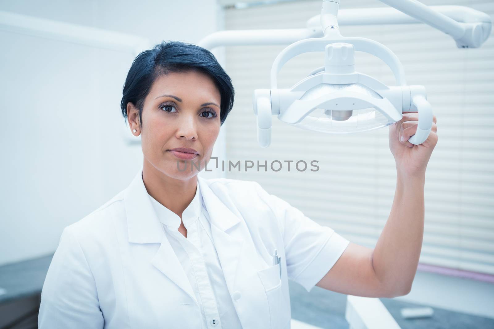 Portrait of confident female dentist