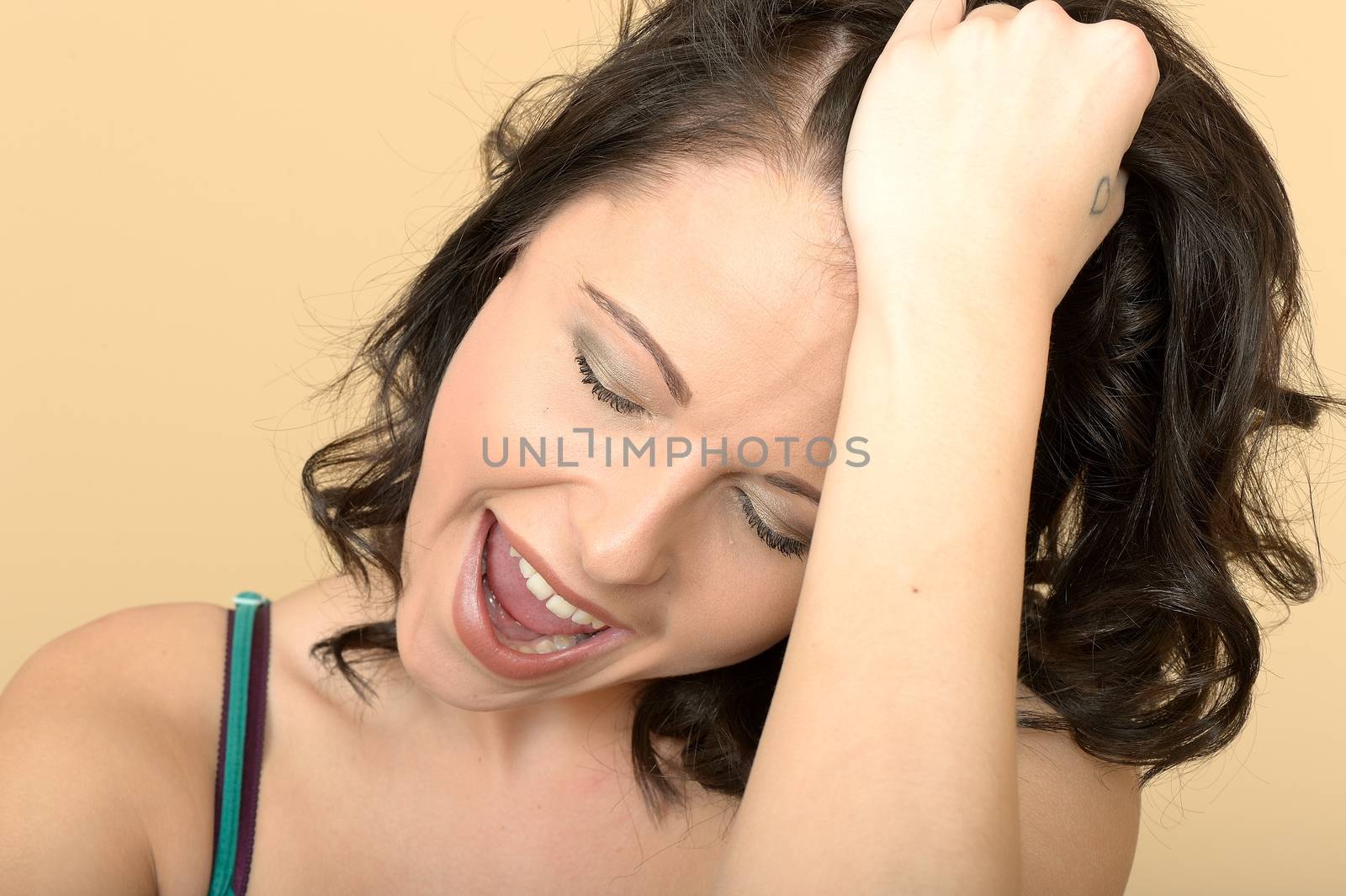 Angry Tense Attractive Young Woman Looking Stressed by Whiteboxmedia