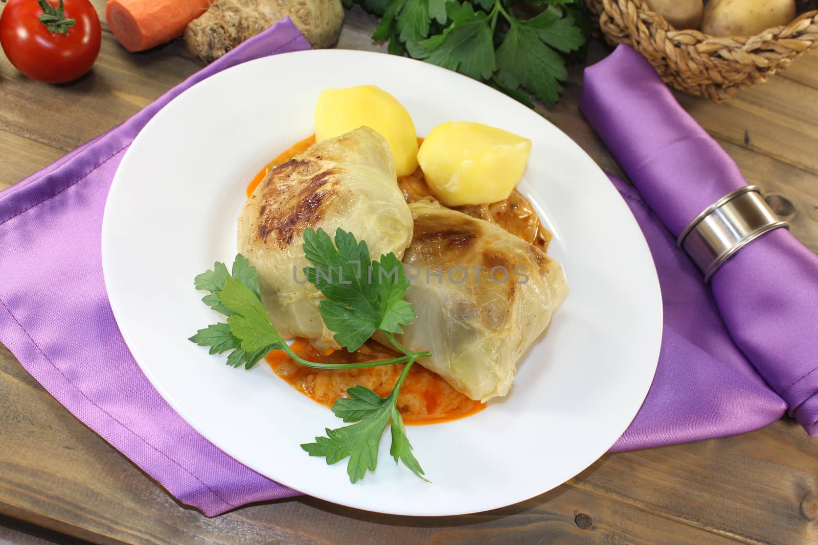 braised cabbage roulade with potatoes by discovery