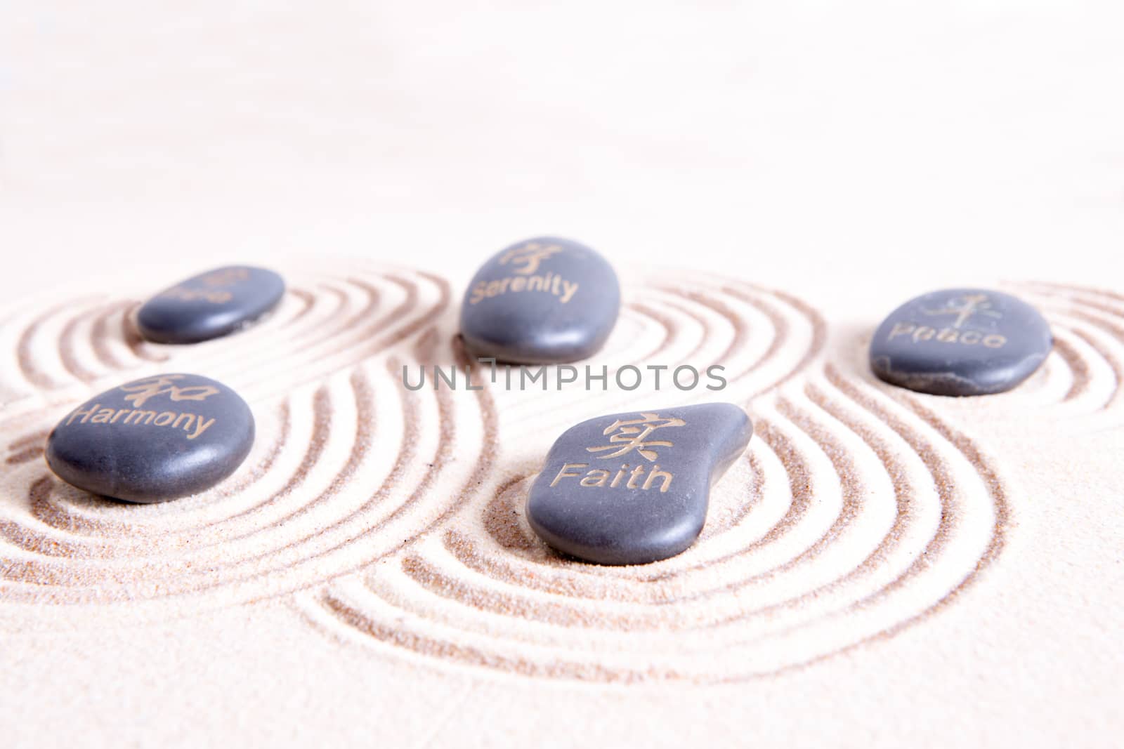 Zen art with swirling lines in golden sand by coskun