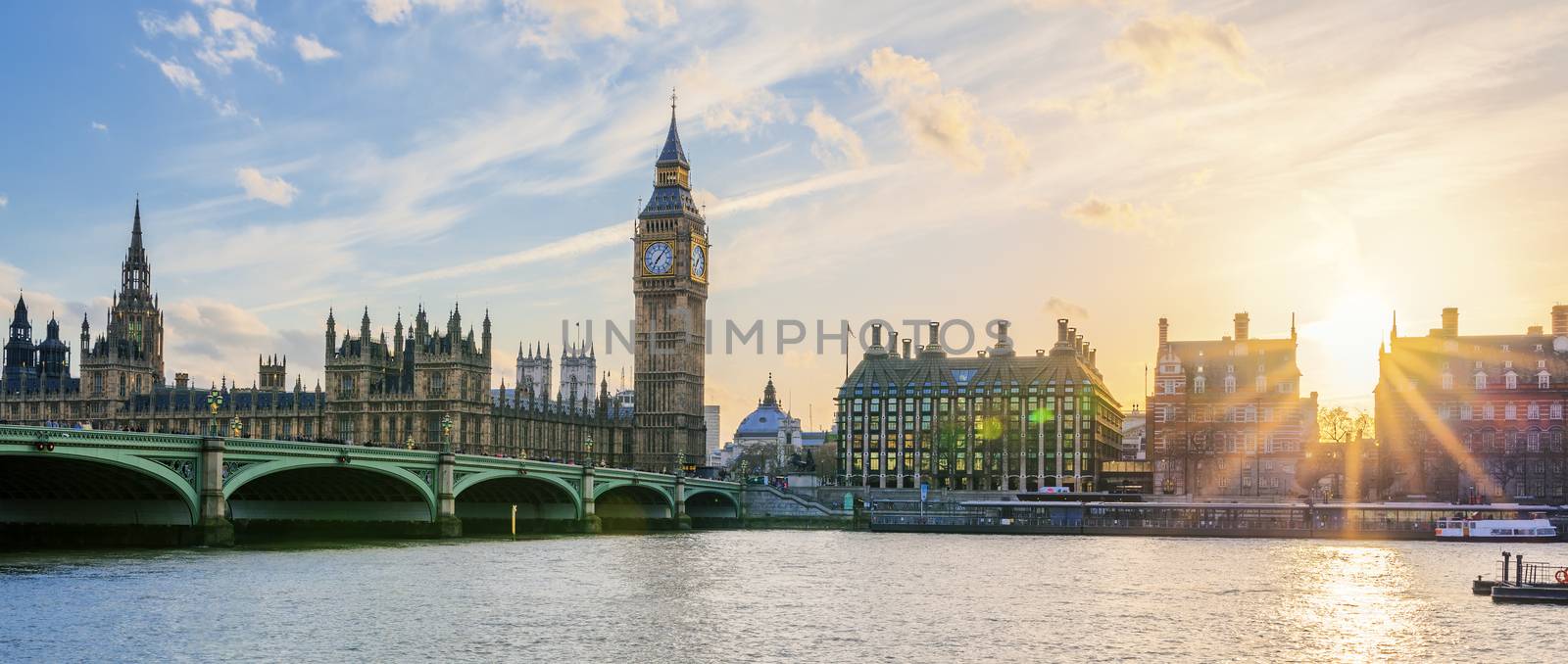 Panoramic view of Big Ben clock tower in London at sunset, UK.