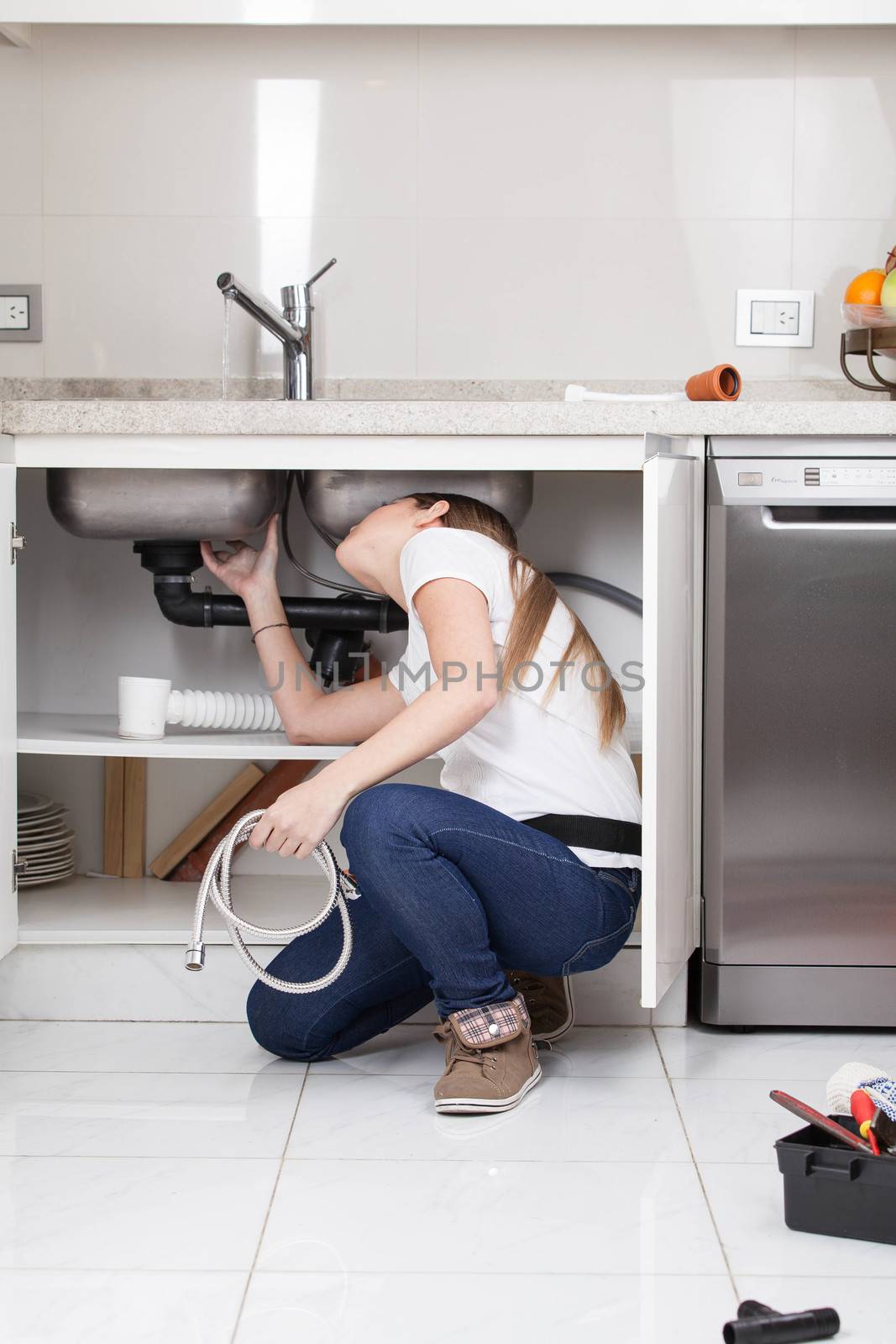 Woman checking the sink