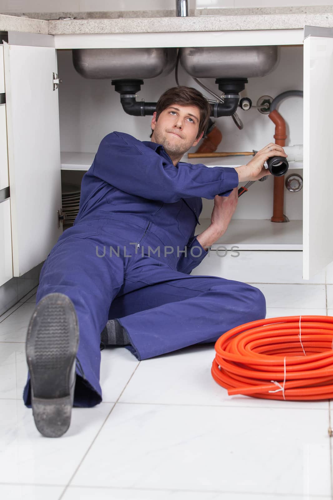 Plumber working hard