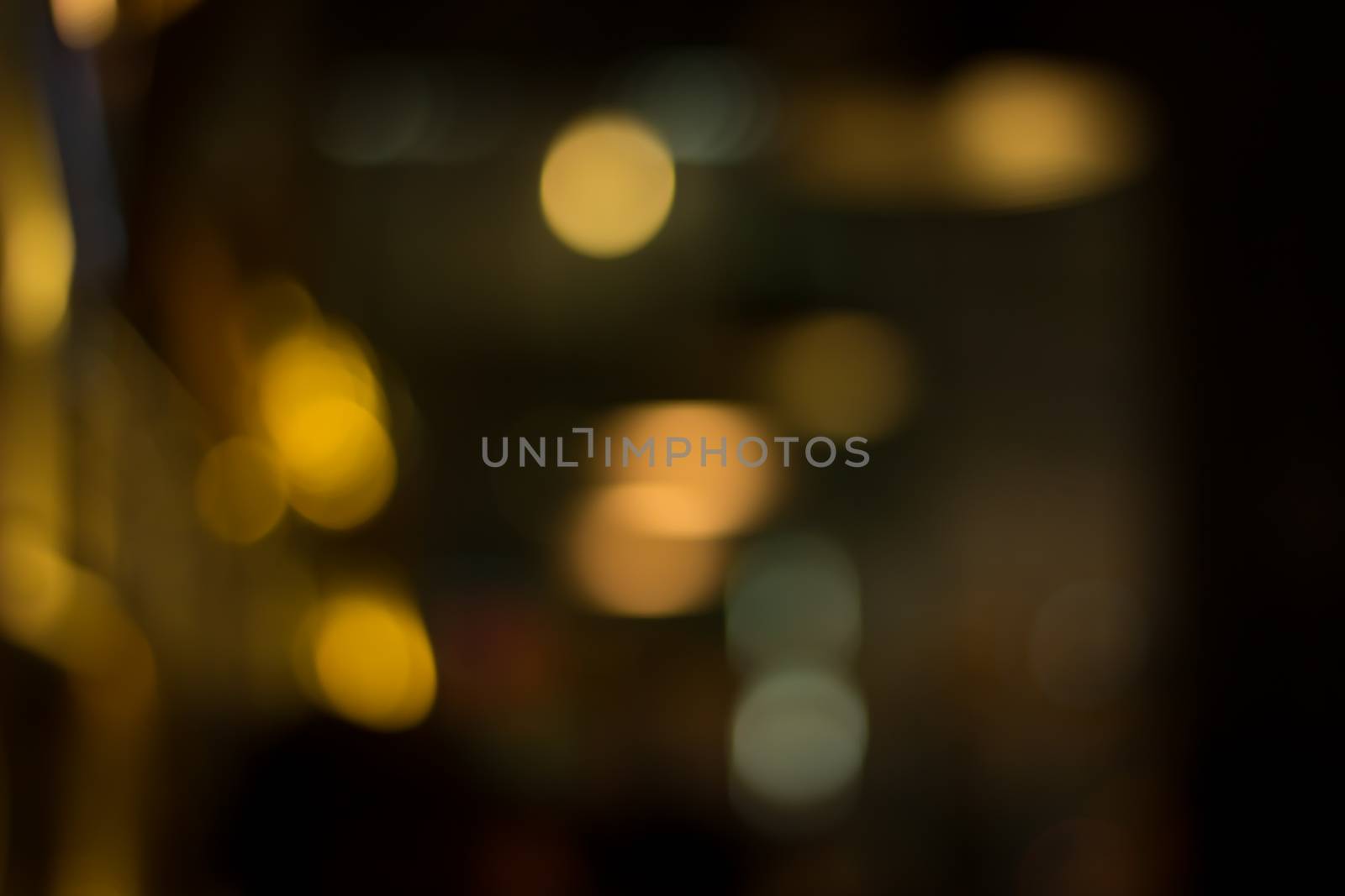 abstract city night light blur bokeh , defocused background by kaisorn