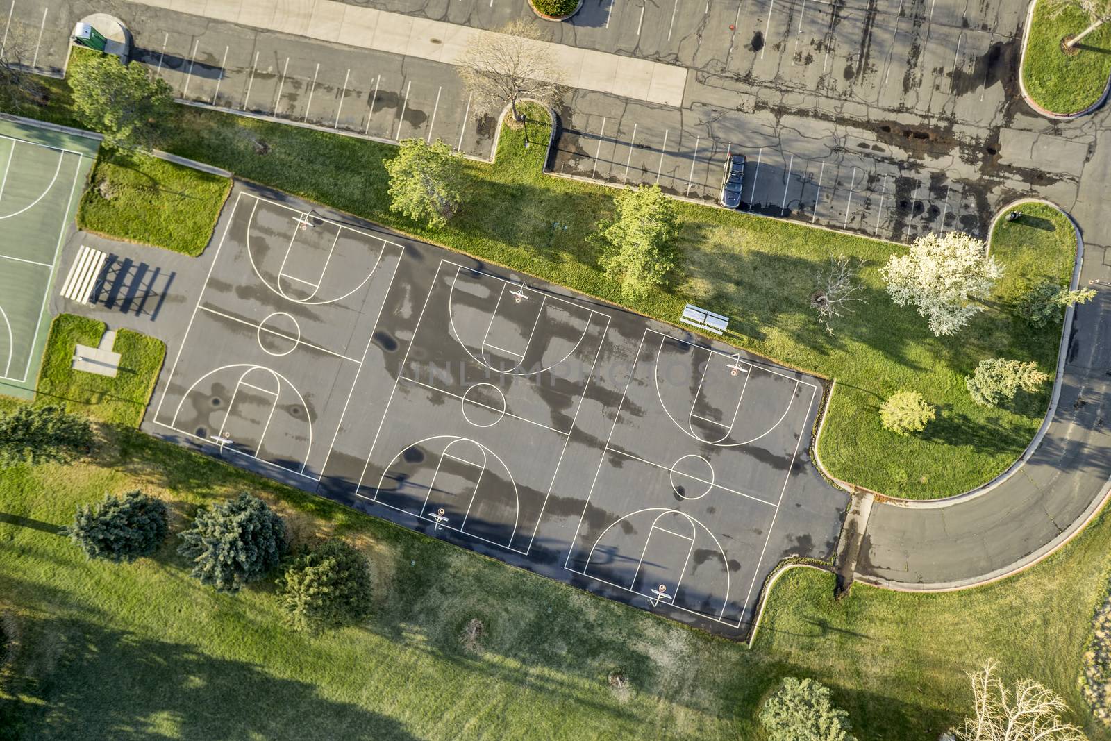 aerial view of basketball courts by PixelsAway